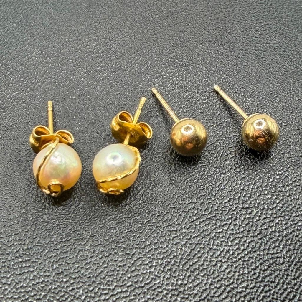 Two Pairs of 14k Gold Stud Earrings, One Pearl: This piece of jewelry has been tested and researched prior to listing. Please view all our pictures they are part of our description. DETAILS: Metal - 14k Gold Color - Yellow Gold Stones - Pearl (one