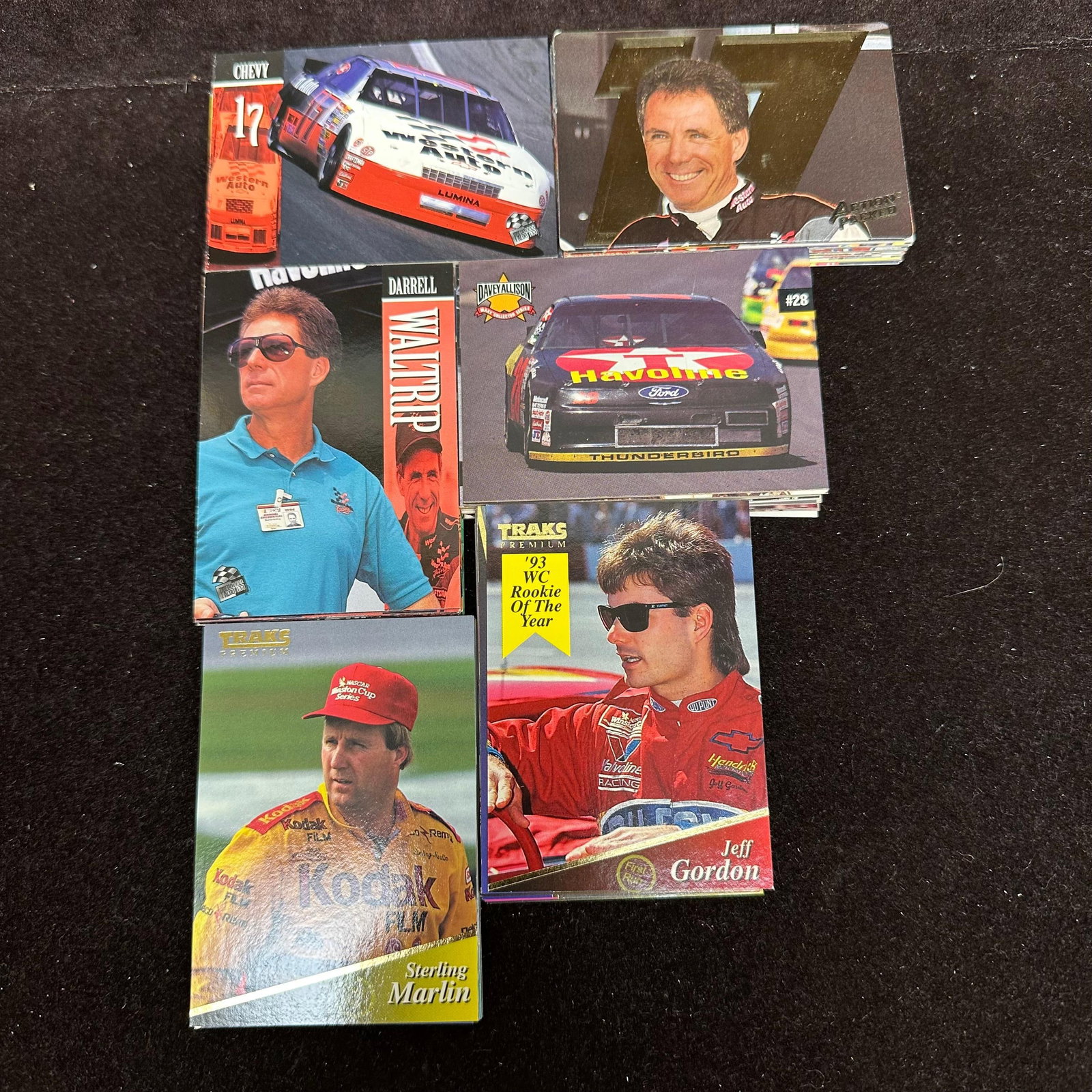 NASCAR Race Trading Cards Collection 120 Kodak Action Packed X47: Cards are loose and not stored in sleeves or protective holders. The condition shows typical handling and storage wear consistent with loose trading cards. The lot includes duplicates. Approximately 1