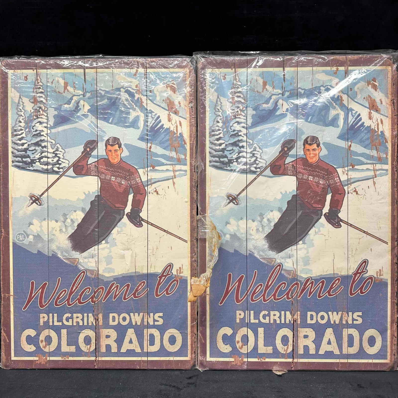 Vintage Style Wooden Ski Signs Welcome to Pilgrim Downs Colorado Retro Wood Sign Set: Vintage Style Wooden Ski Signs Welcome to Pilgrim Downs Colorado Retro Wood Sign Set. Metal hang hook holder on the back of each sign. No identifying markings or makers mark. Brand New sealed in
