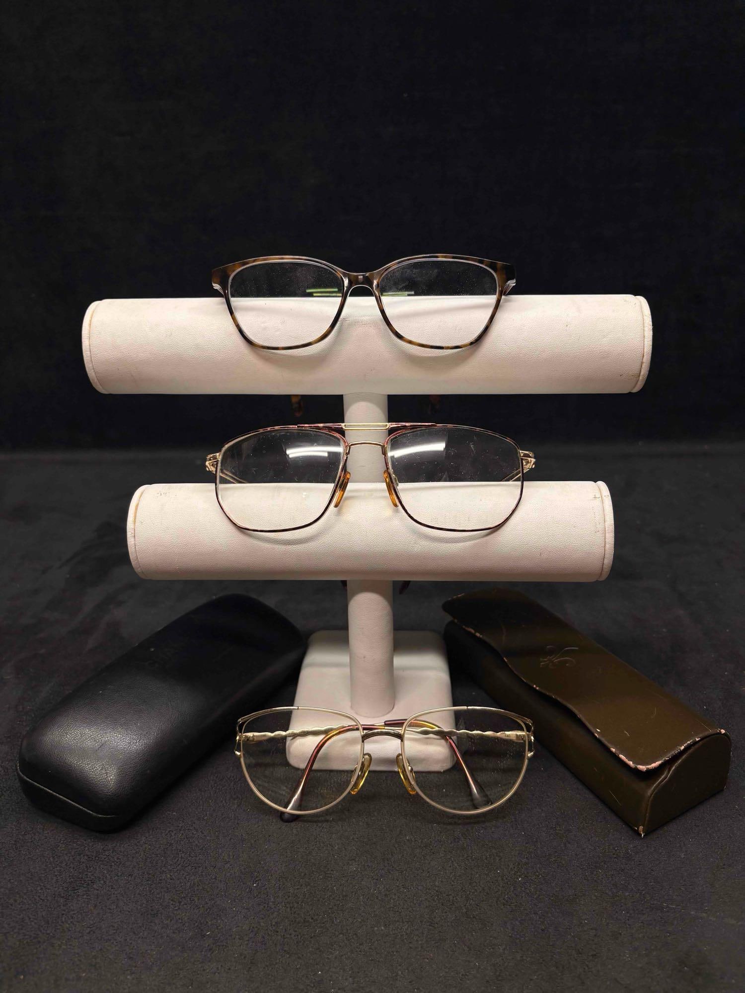 5pc MISC Retro Eyeglasses Set: Consisting of 3 pairs of eyeglasses and 2 eyeglass cases, this lot stands in good conditions despite its age. There are some minor signs of scratches/scuffing on the lenses of each eyeglasses. Only on