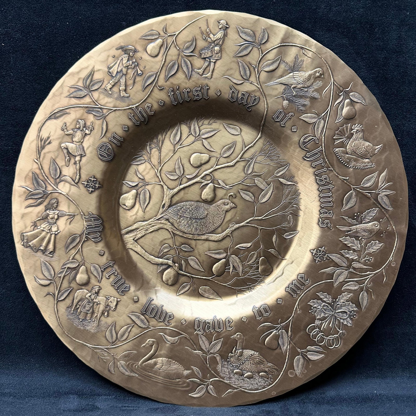 Wendell August Twelve Days of Christmas Solid Bronze Limited Edition Plate: Hand-hammered solid bronze decorative plate by Wendell August, part of the 2001 Limited Edition Twelve Days of Christmas series. Features a detailed repousse design with partridge in a pear tree 