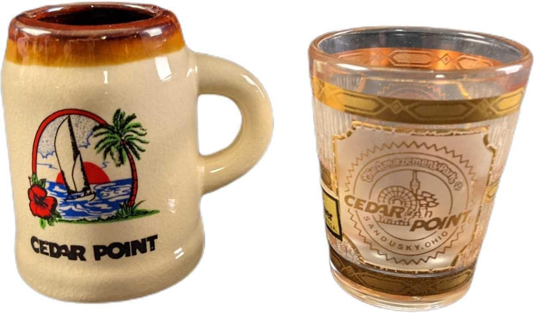 Cedar Point Souvenir Ceramic & Glass Shot Glasses: This lot includes: (1) Ceramic Mug Shot Glass/Toothpick holder. Also comes with a bag of toothpicks. Is approx 3" x 1 1/2" x 2 1/2" (1) Culver 22k Gold Glass Shot Glass. Is approx 2" x