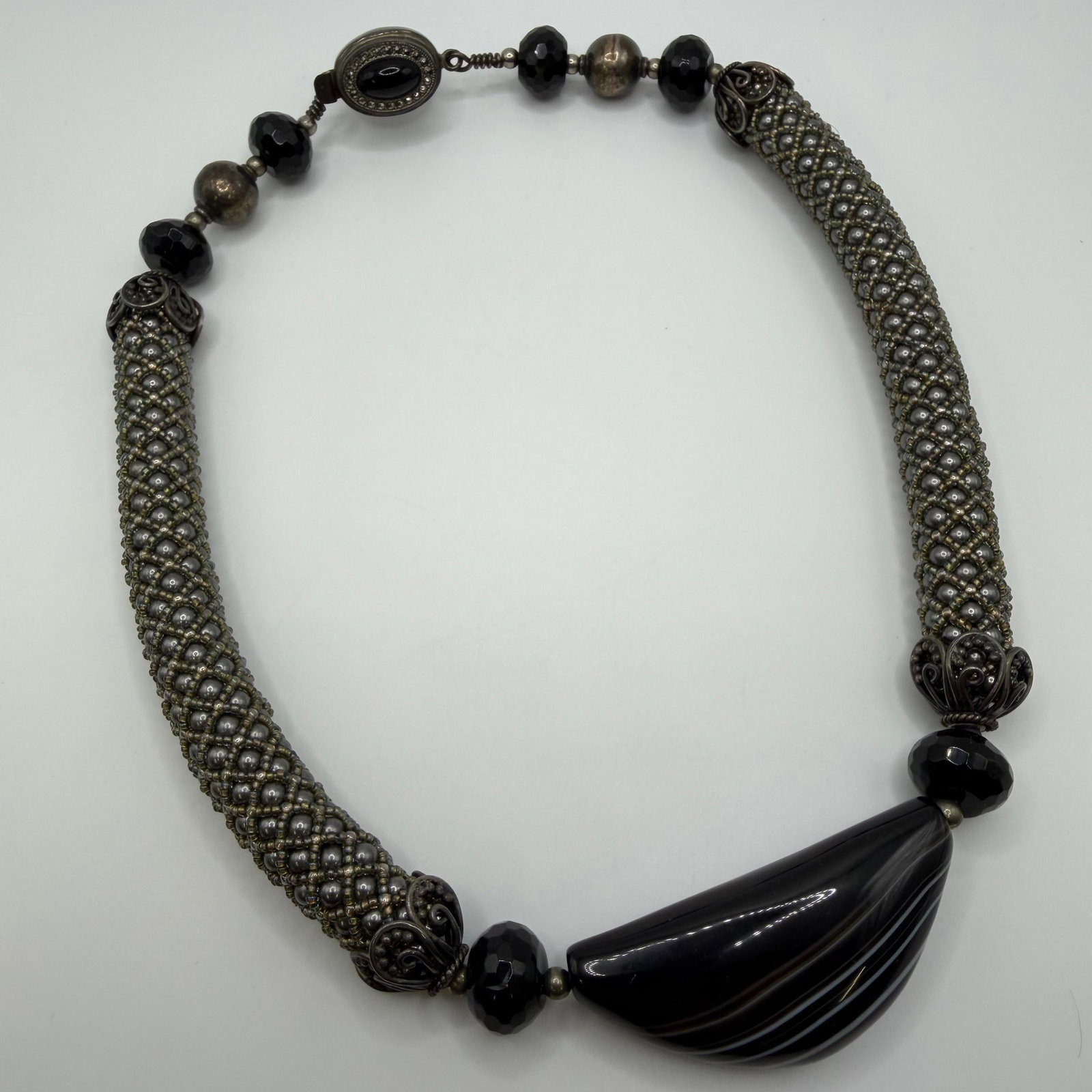 Artisan Sterling Silver Black Onyx and Banded Agate Large Pendant Necklace: This item is in pre-owned, previously used/displayed condition with noticeable light wear and surface scratches. Please reference all photos for full details. This piece of jewelry has been tested and