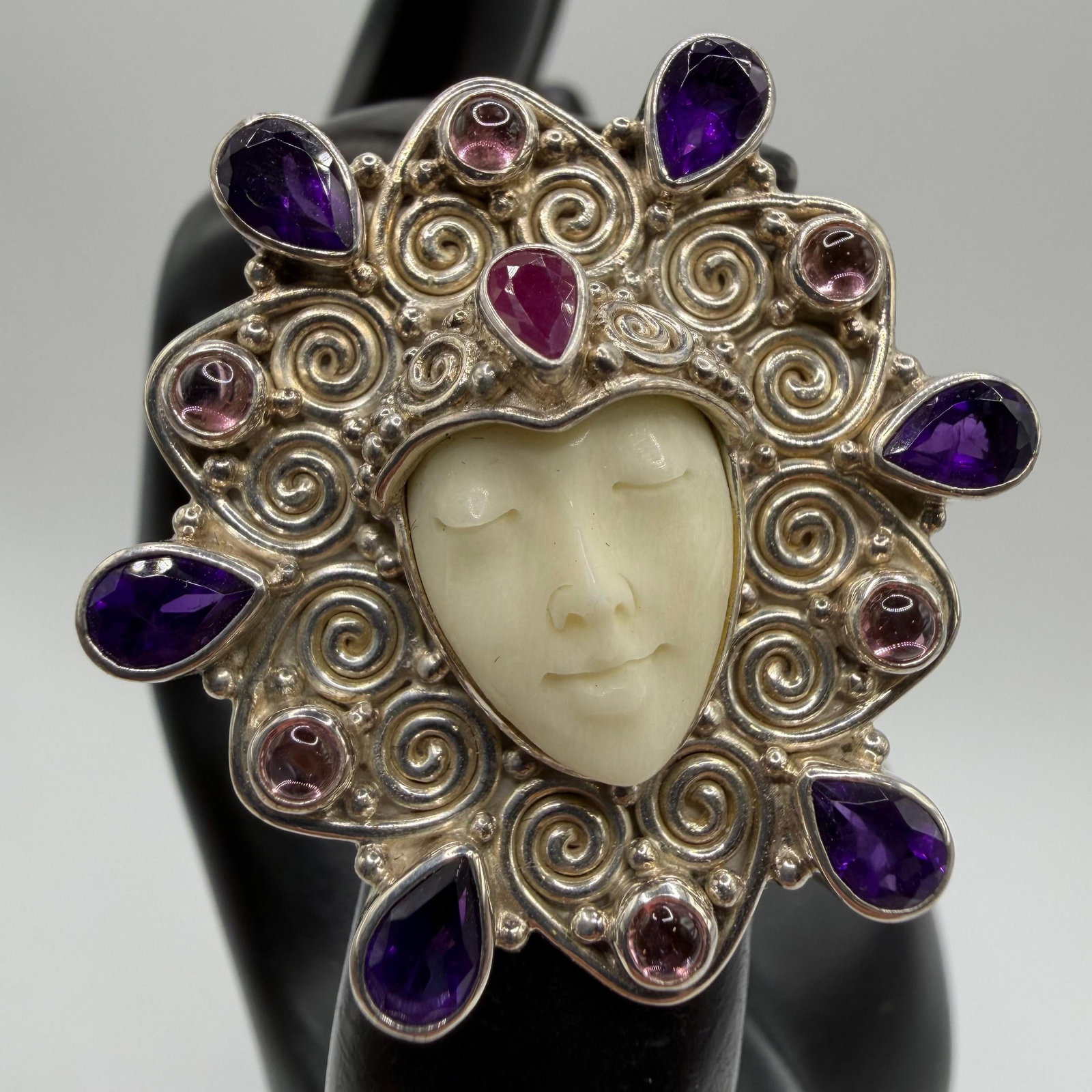 Sajen Carved Bone Style Face Goddess Pink Tourmaline and Amethyst Sterling Silver Pendant Brooch: This item is in pre-owned, previously used/displayed condition with noticeable light wear and surface scratches. Please reference all photos for full details. This piece of jewelry has been tested and