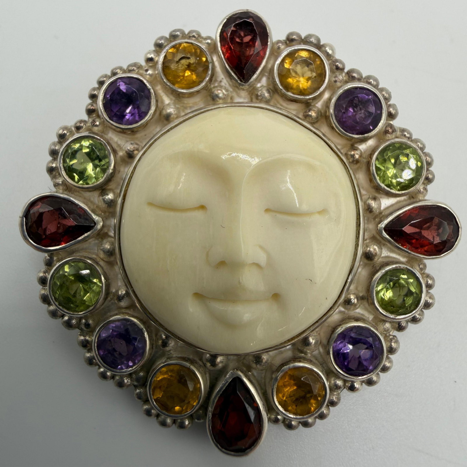 Sajen Carved Moon Face Goddess Multi Stone Sterling Silver Pendant Brooch HG50: This item is in pre-owned, previously used/displayed condition with noticeable light wear and surface scratches. Please reference all photos for full details. This piece of jewelry has been tested and