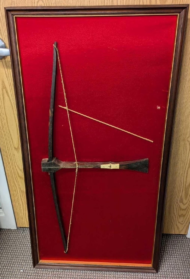Vintage Framed Decorative Crossbow With Bolt: Vintage Framed Decorative Crossbow With Arrow. This is approx 23 1/2" x 1 1/4" x 44" and it weighs 7.80lbs. The backing felt has some glue and scratches and is missing its bolt. The maker and date of 