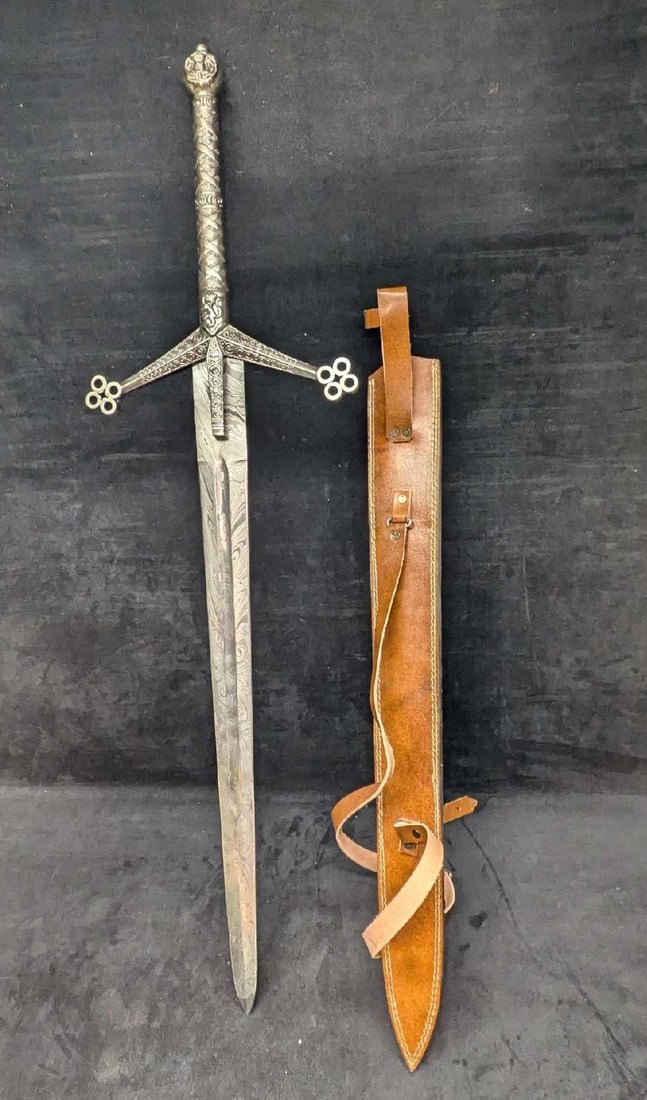 MHS Cutlery Fantasy Steel Sword With Leather Scabbard C: MHS Cutlery Fantasy Steel Sword With Leather Scabbard C. This is approx 10 7/8" x 2 x 38 1/8" and it weighs 4lbs. Has an Damascus printed design over the steel.Please see the images as they are part
