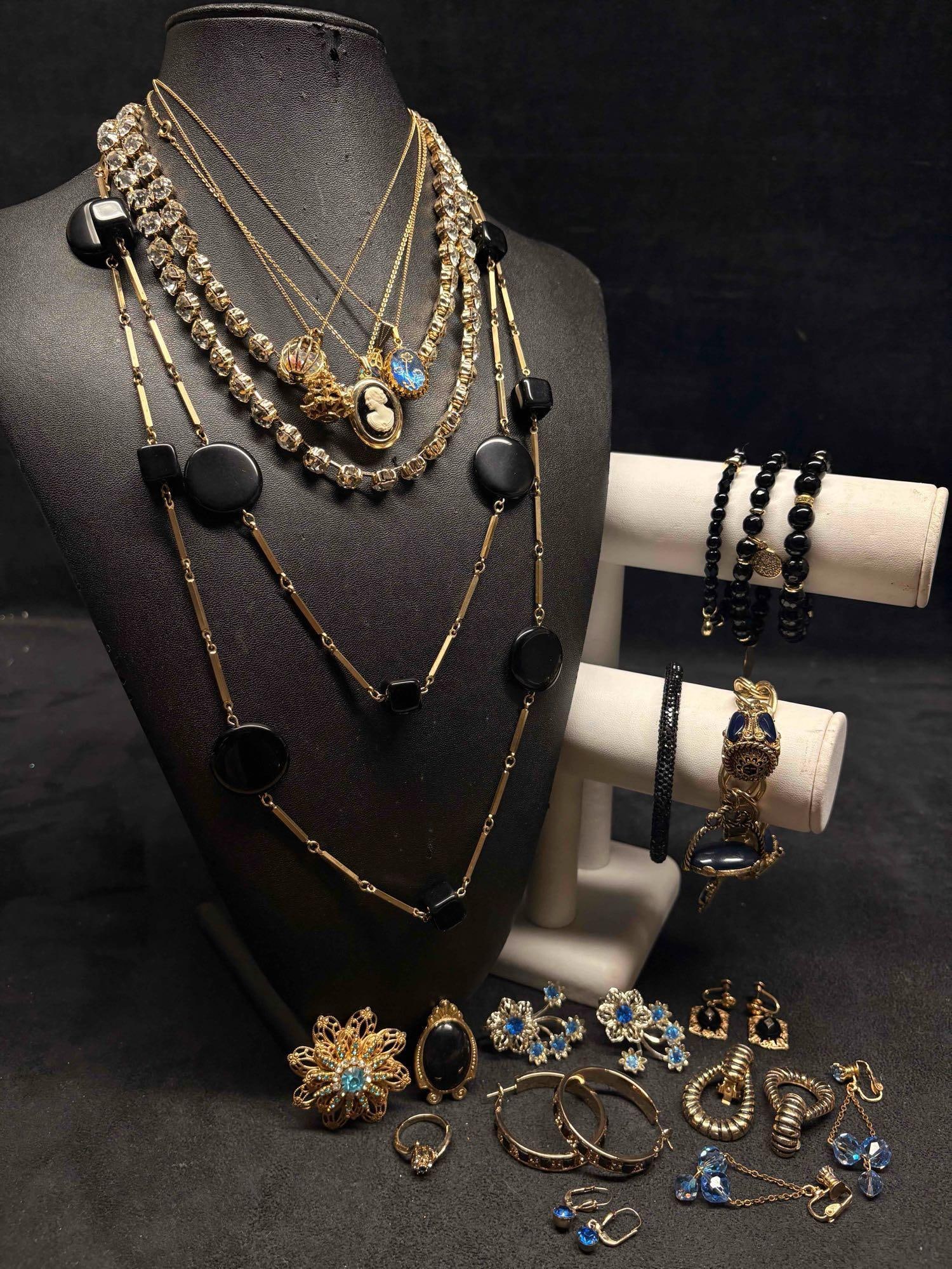 19pc Blue Black and Gold Tones Noir and Nugget Costume Jewelry Collection: This lot contains 19 pieces of pre-owned costume jewelry, paired together in a stylized set. Each piece is in good conditions, with wear and tear over the years visible on some of the jewelry. Please 