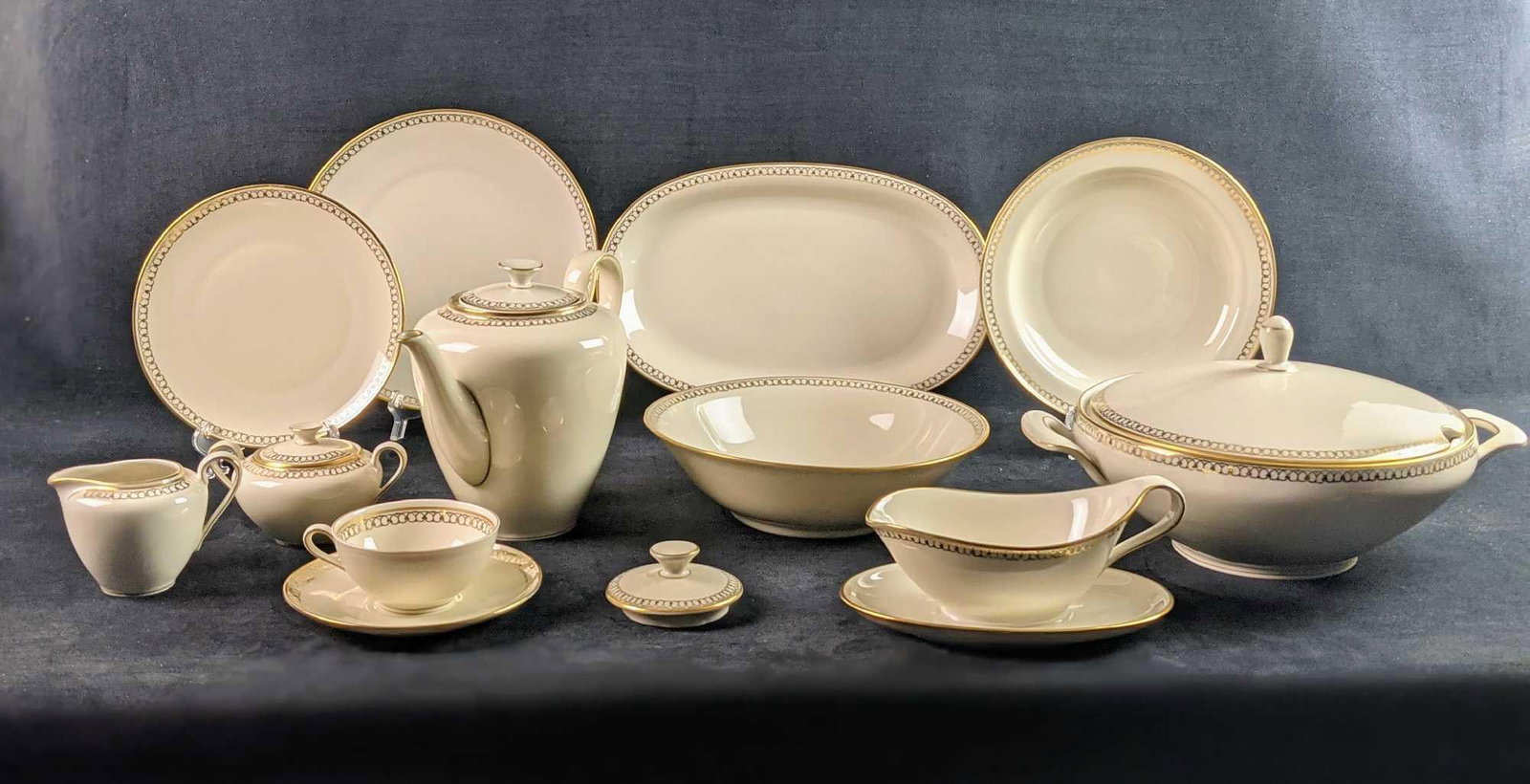 Winterling Roslau Bavaria Gold 84 Fine China Lot Of 40: This lot includes: (1) Oval Platter. This is approx 12 1/4" (1) Serving Bowl With Lid. This is approx 13" x 10" x 7". (1) Tea Pot. This is approx 9 1/2" x 6" x 7 1/2". (2) 