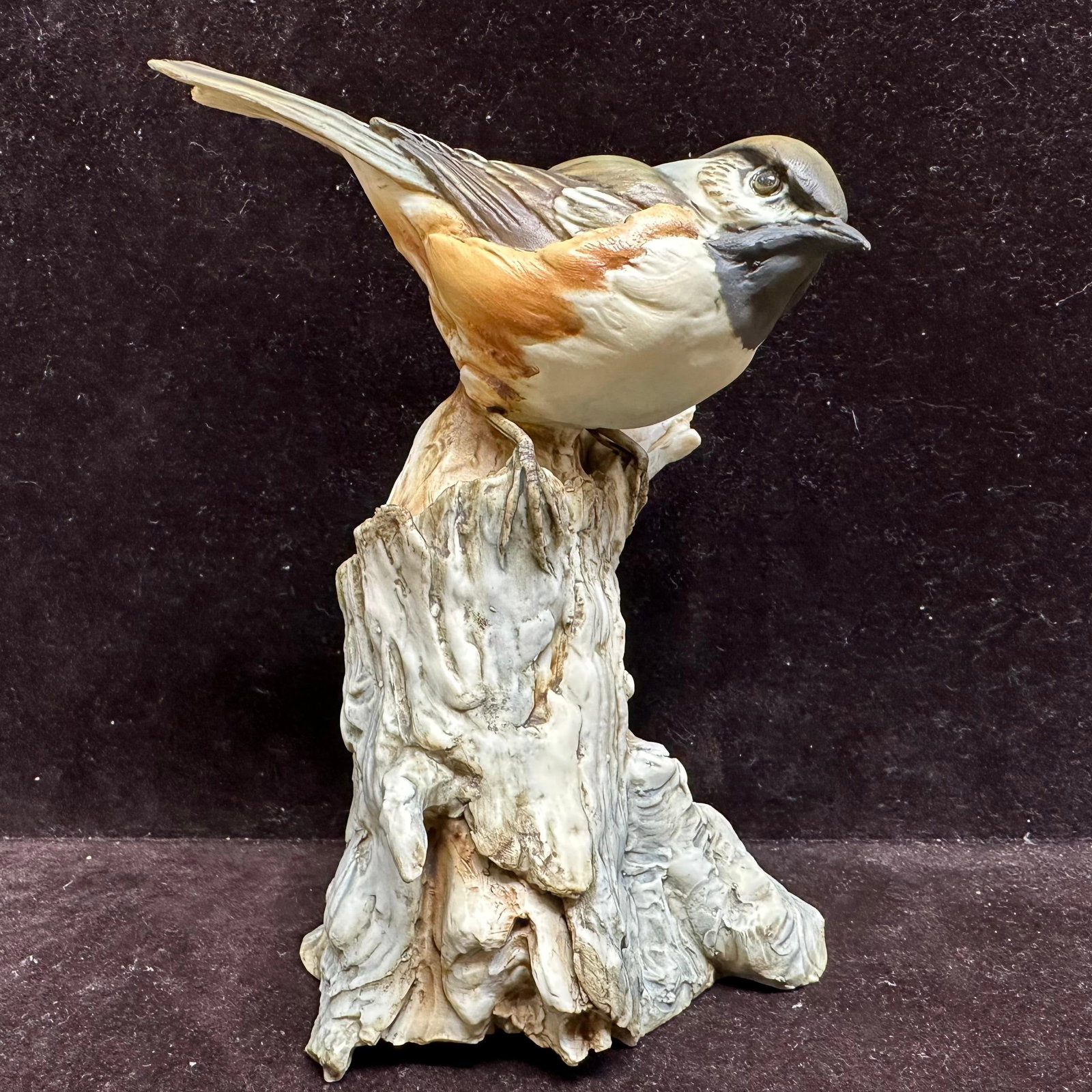 TAY–Italy Limited Edition Porcelain Bird on Stump No. 156/1000: Hand-painted porcelain figure of a songbird perched on a weathered tree stump. Base is marked “TAY Italy” and stamped “LIMITED EDITION 1000 PIECES – No. 156.” Retains