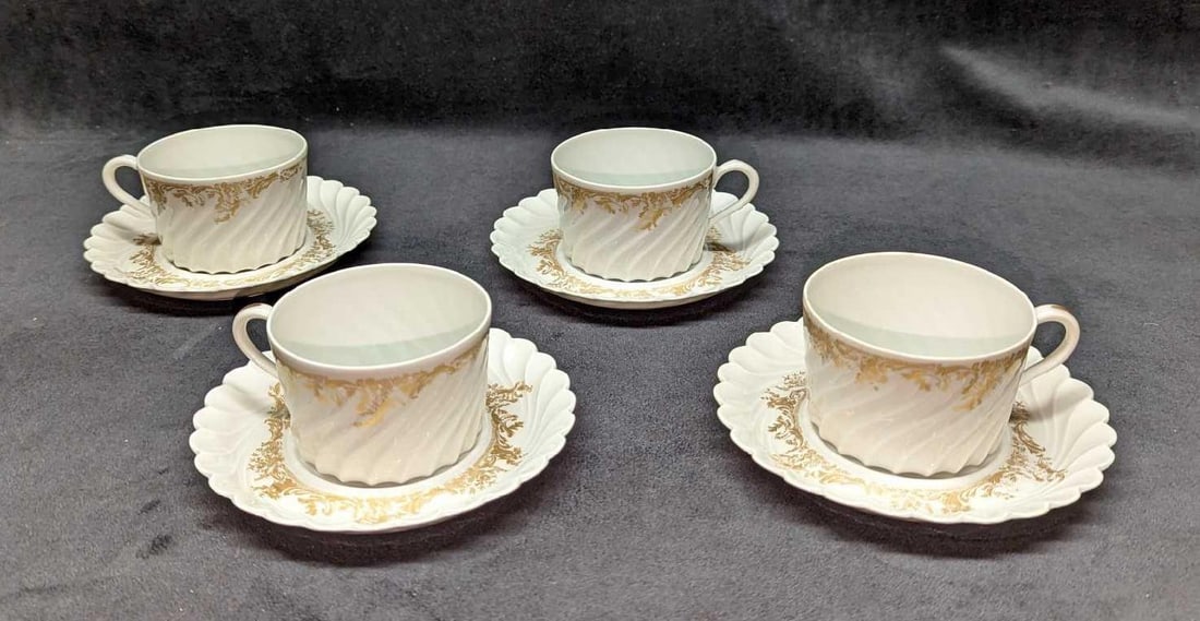 4 Retired Haviland Ladore Cups & Saucers: 4 Retired Haviland Ladore Cups & Saucers. This Gold on White series of fine china was released in 1962 - 1988. The lot contains: (4) Cups. These are approx 4" x 3" x 2". The four cups
