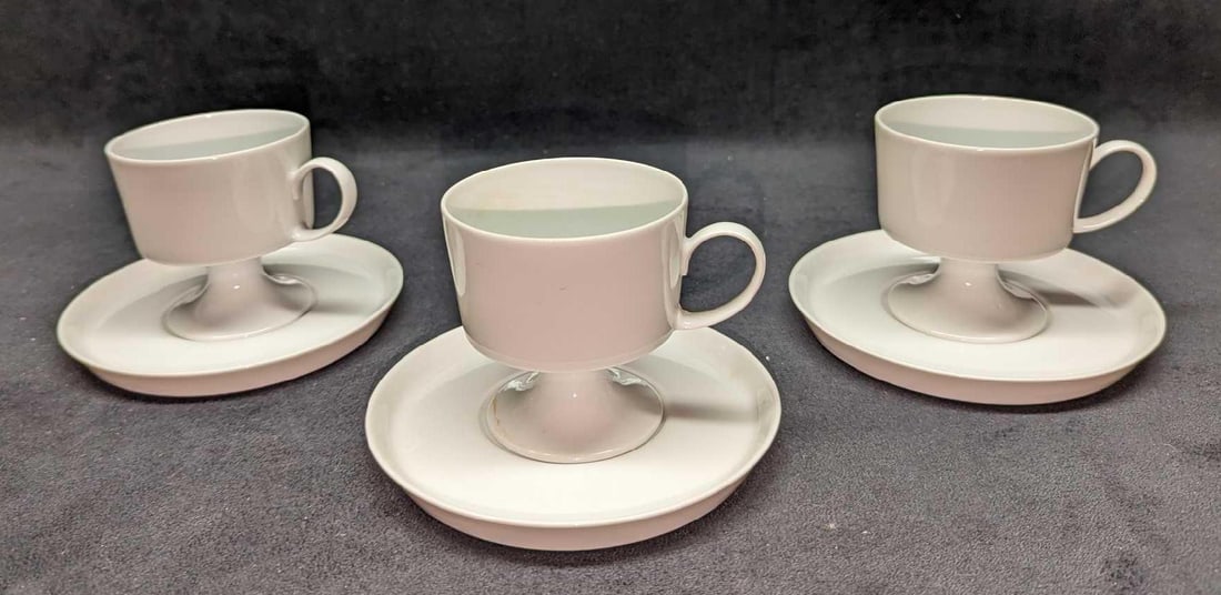 3 Retired Rosenthal China Footed Cup & Saucer Sets: 3 Retired Rosenthal China Footed Cup & Saucer Sets. The saucers are approx 5 3/4" x 1/2" x 5 3/4". Each cup is approx 4 3/8" x 3 3/8" x 4 1/4". The total weight is 2.04 lbs. One of the saucers ha