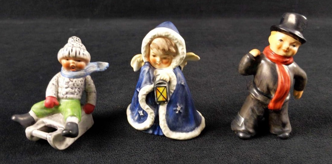 Three Vintage Goebel German Figurines: This lot of Goebel hand-painted figurines consists of: (1) Chimney Sweep Boy. Is approx 2" x 1" x 4". He is missing his ladder. Figurine has no known damage. (1) Boy On Sled. Is