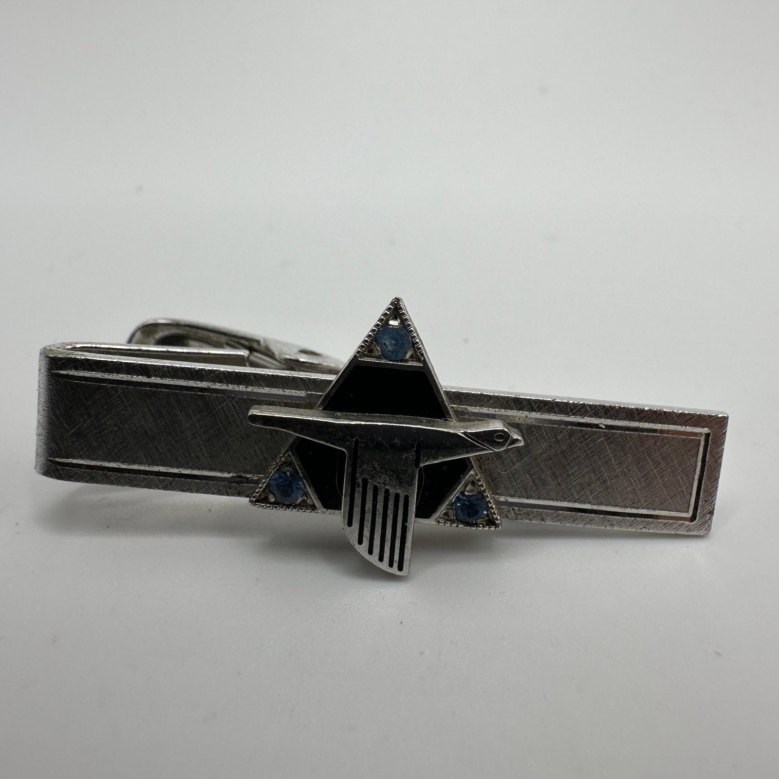 Sterling Silver North American Aviation Tie Clip Black Enamel Blue Rhinestones: This item is in good pre-owned, previously used/displayed condition with noticeable light wear and surface scratches. Please reference all photos for full details. This piece of jewelry has been teste