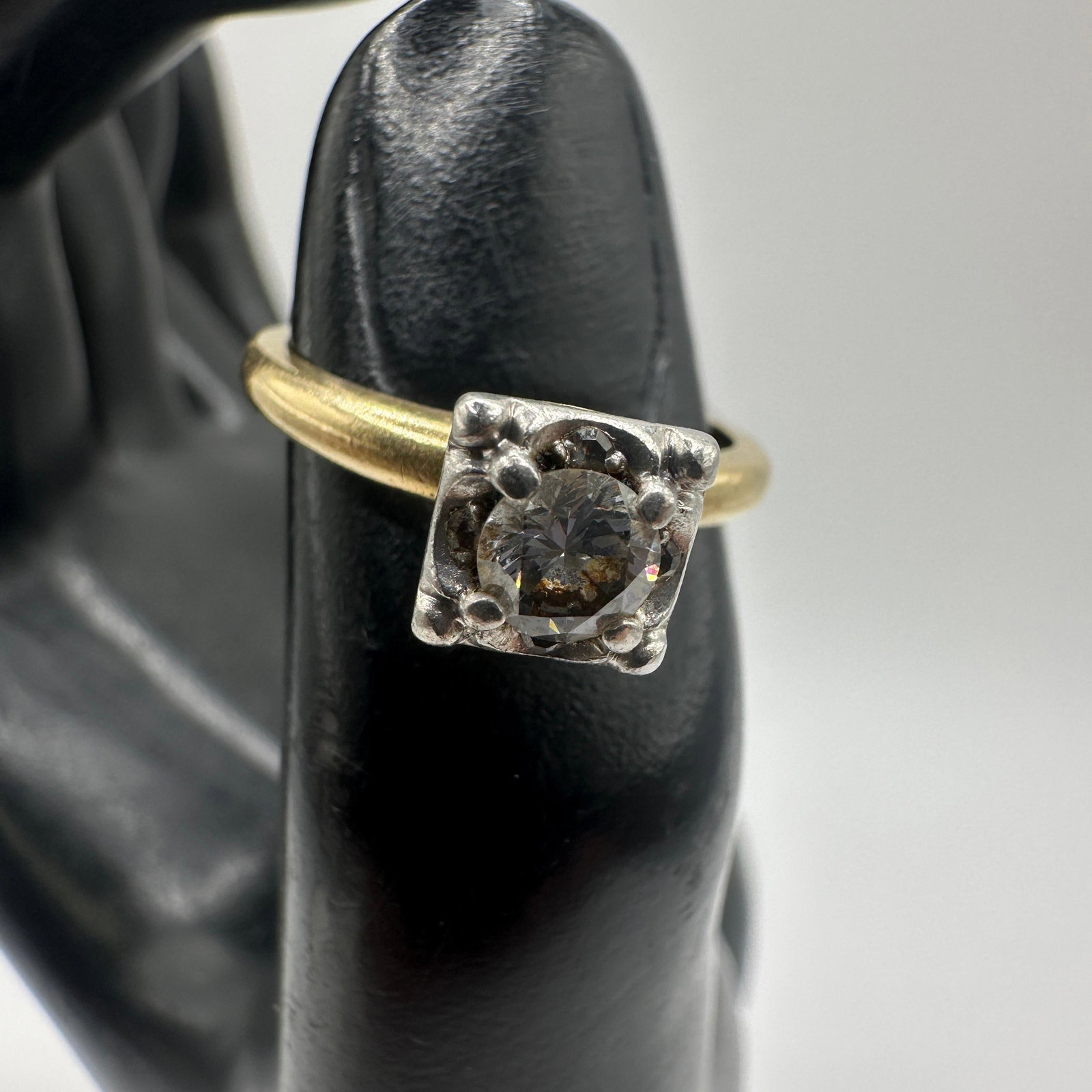 Two-Tone 14K Gold Band and Platinum Square Diamond Settings: This item is in good pre-owned, previously used/displayed condition with noticeable light wear and surface scratches. Please reference all photos for full details. This piece of jewelry has been teste