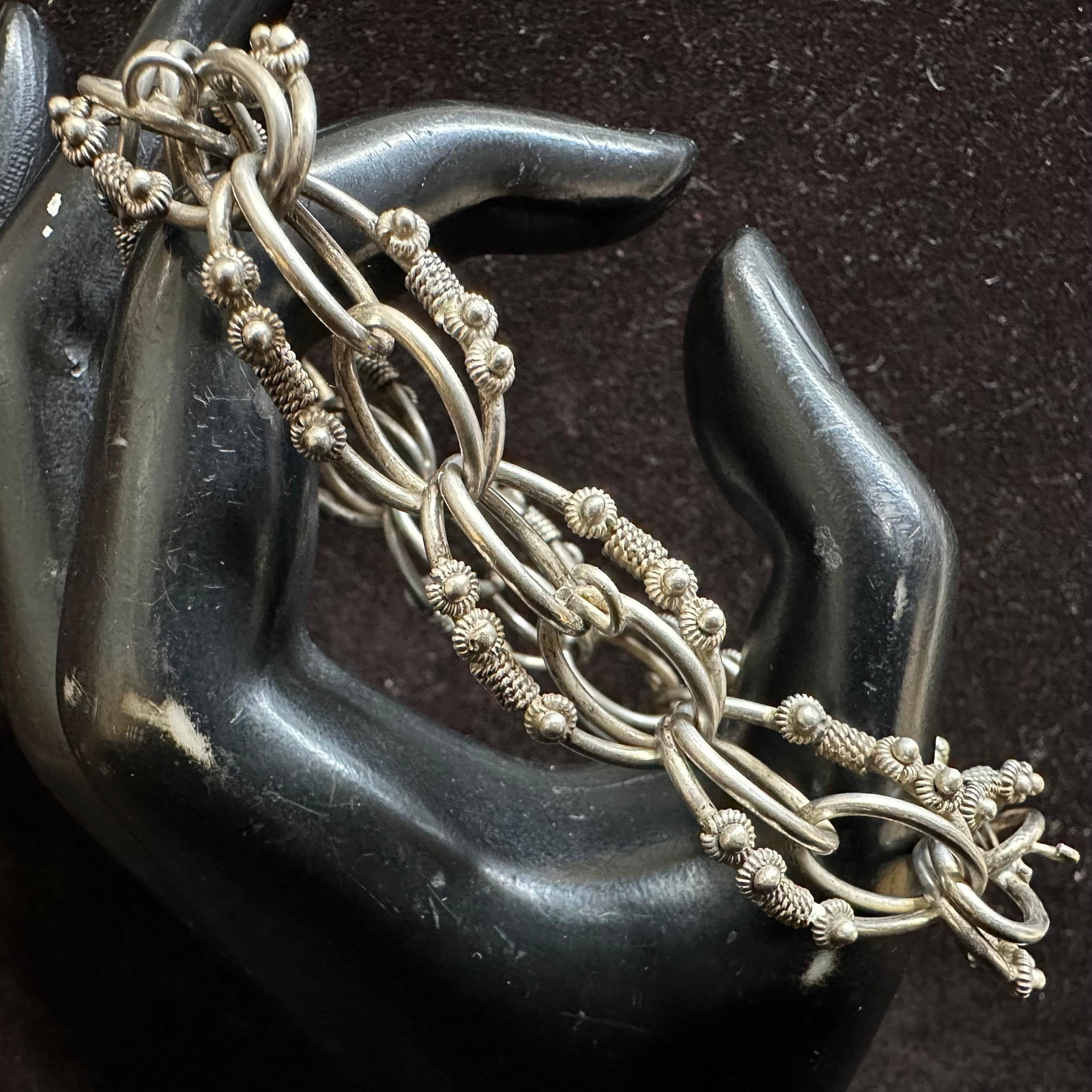 Interlocking Link Silver 800 Bracelet: This item is in good pre-owned, previously used/displayed condition with noticeable light wear and surface scratches. Please reference all photos for full details. This piece of jewelry has been teste