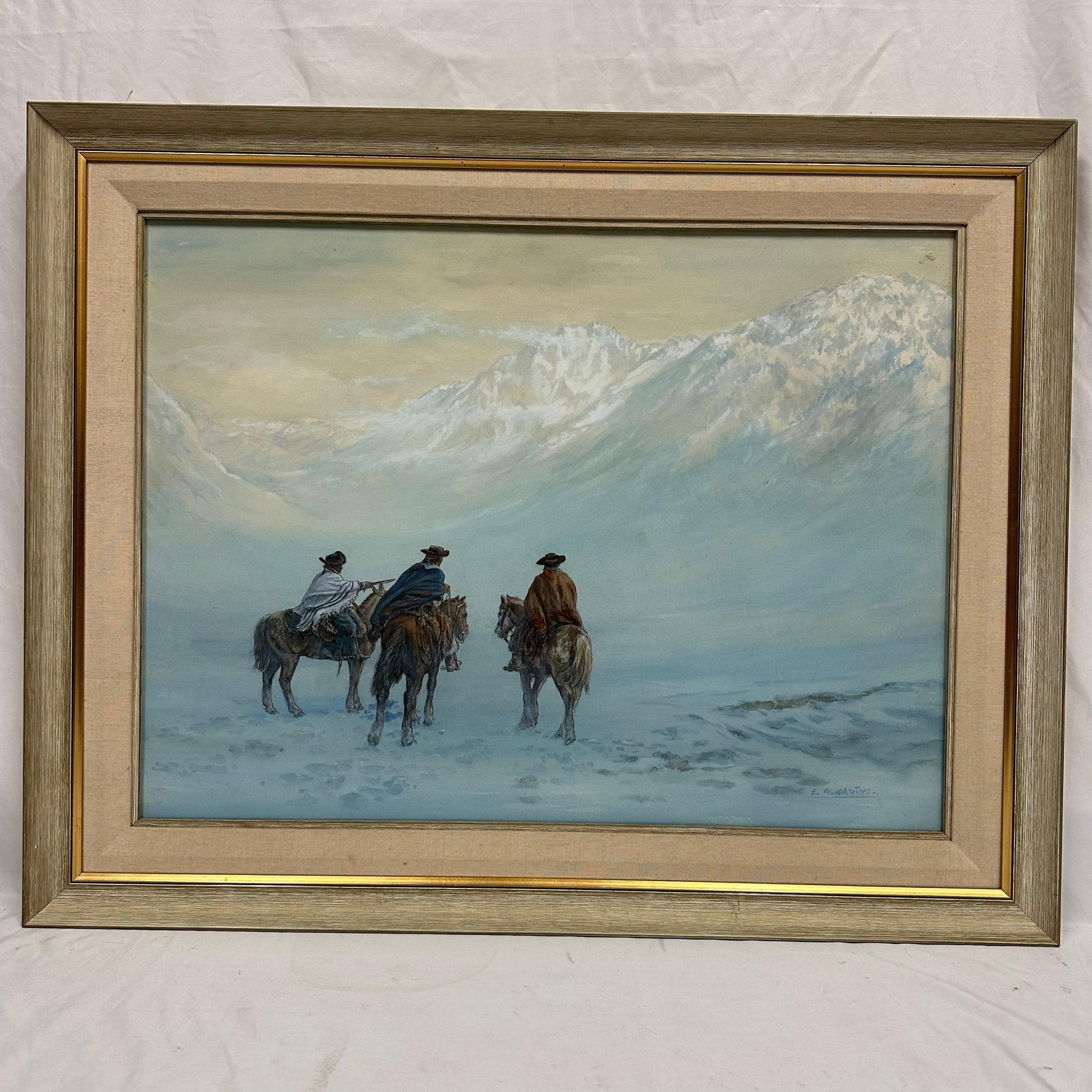 Esteban Roberto E.R. Garino Original Watercolor Three Horsemen Snowy Mountain Landscape Framed: Original watercolor painting signed E.R. Garino. The scene depicts three mounted riders traveling through a snowy mountain landscape. Soft blue tones with detailed figures and horses. Artwork is