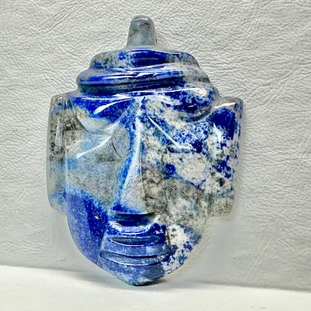Large Hand-Carved Lapis Lazuli Tribal Mask Pendant: This piece of jewelry has been tested and researched prior to listing. Please view all our pictures they are part of our description. DETAILS: Metal - none Color - blue Stones - lapis lazuli Hallmarks