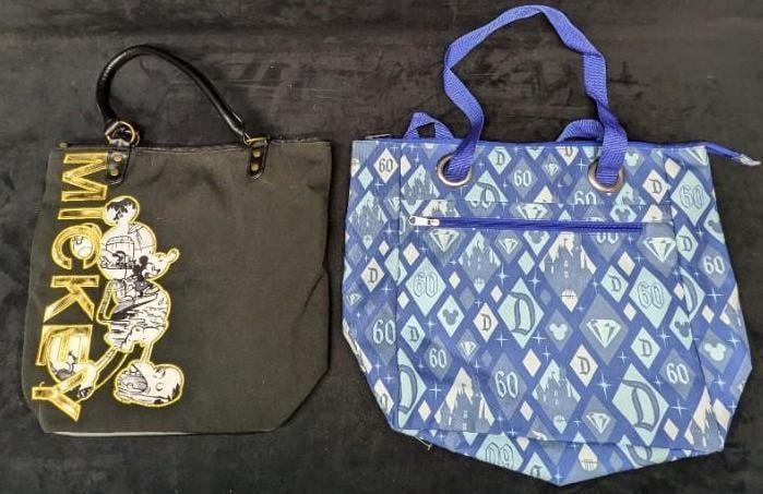 Disneyland 60th Anniversary & Mickey Mouse Tote Bags: Disneyland 60th Anniversary & Mickey Mouse Tote Bags. This lot includes: (1) Disneyland 60th Anniversary Blue Tote Bag. This is approx 18" x 2" x 15" (21" with handle up). (1