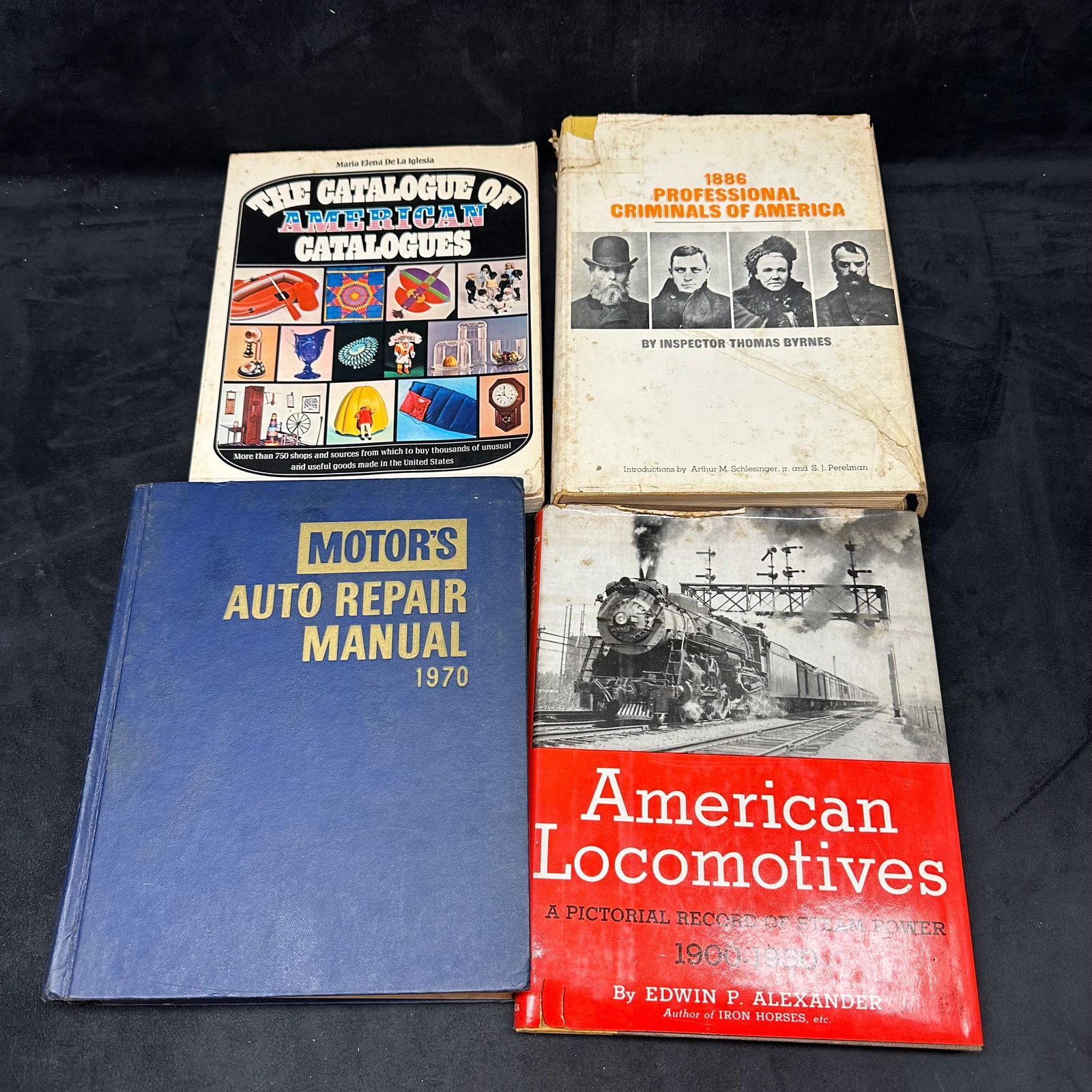 Lot of 4 Vintage Reference Books Professional Criminals of America Manual and Catalogues: Collection of four vintage hardcover reference and historical books covering diverse subjects from American railroads to true crime and mechanical repair. Titles include: Professional Criminals of Ame