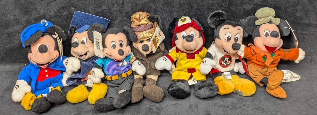 7 Disney Assorted Mickey Mouse Bean Bag Dolls: 7 Disney Assorted Mickey Mouse Bean Bag Dolls. The "Disney Quest" has some residue on the pants. Please see the images for a list of the different Mickey Mouse bean bag dolls. All come in a bag that i