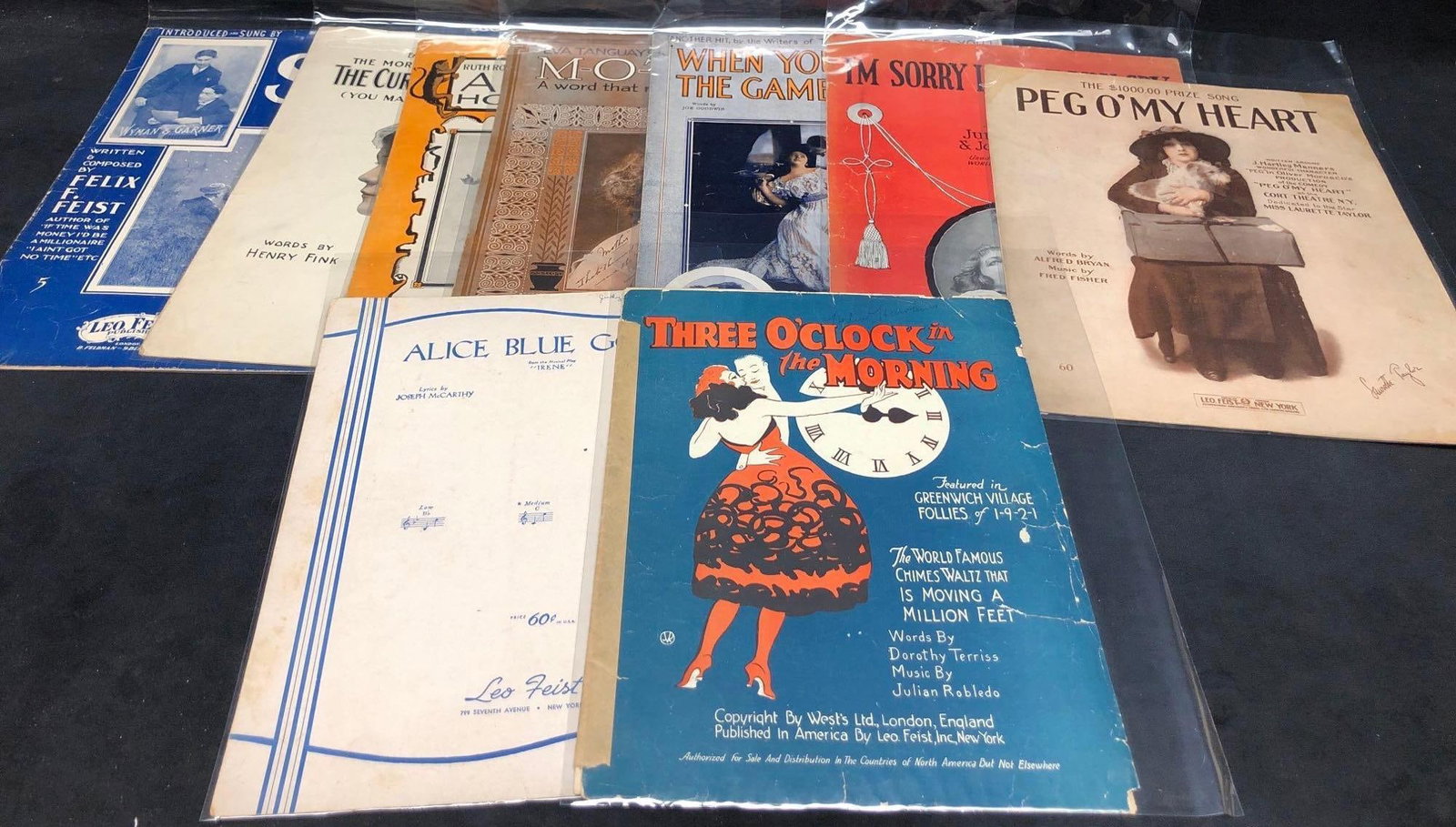 9 Vintage Sheet Music - Published by Leo. Feist Inc. (KC1): 9 Vintage Sheet Music, Published by Leo. Feist Inc. Lot includes: "Peg O' My Heart" 10-3/4" x 13-1/2" "On A Starry Night" 11" x 14" "Aba Daba Honeymoon" 10-