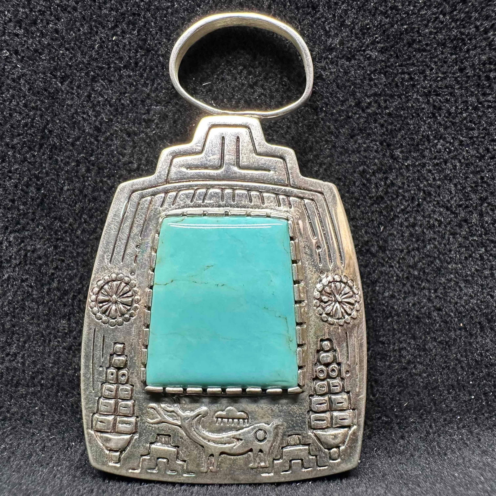 Sunface Carol Felley Turquoise Reversible Kachina Sterling Silver Pendant: This item is in good pre-owned, previously used/displayed condition with noticeable light wear, and surface scratches. Please reference all photos for full details. This piece of jewelry has been test