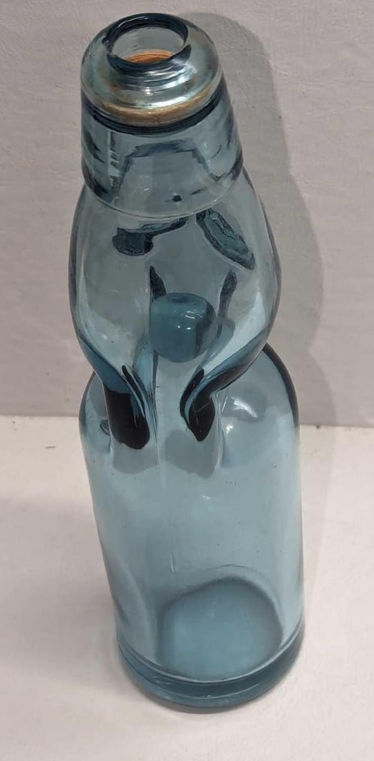 Vintage Soda Bottle Japanese Codd Neck Marble Stopper: Vintage Soda Bottle Japanese Codd Neck Marble Stopper. This is approx 2" x 2" x 7 3/4" and it weighs 0.92lb. There is a small chip on the top. Please see the images as they are part of the description