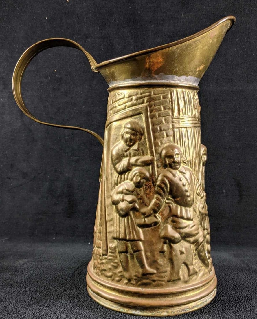 Vintage Brass Hand Soldered Pitcher : Vintage Brass Hand Soldered Pitcher This is a Lombard pitcher hand-made in England. It is silver soldered together and hand hammered. This piece has some tarnishing but has no major damage.
