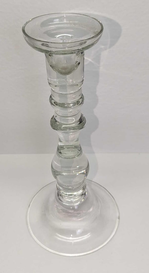 Vintage Clear Glass 10" Candlestick Holder B: Vintage Clear Glass 10" Candlestick Holder B. The maker and date of creation are unknown. This is approx 4 5/8" x 4 5/8" x 10" and it weighs 1.27lb.