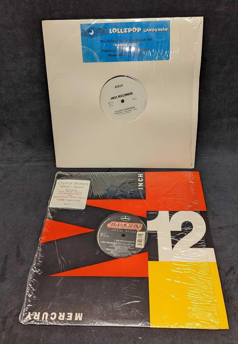 2 Aqua And Crystal Waters Mix LPs: 2 Aqua And Crystal Waters Mix LPs. This lot includes: (1) Aqua – Lollipop (Candyman). This was released by MCA Records in 1997. (1) Crystal Waters – What I Need / 100% Pure