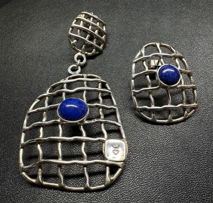 Large Asymmetric Silver Lapis Earrings: This piece of jewelry has been tested and researched prior to listing. Please view all our pictures they are part of our description. DETAILS: Metal - 950 Silver Color - Silver Stones - Lapis Laz