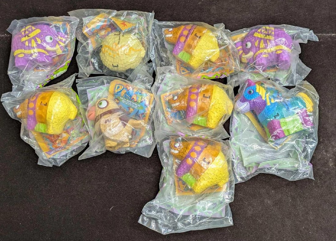 9 Burger King Sealed Viva Pinata Toys: 9 Burger King Sealed Viva Pinata Toys. Based off the cartoon and video game. This lot comes with (4) Fizzy Bear. (2) Ella Elephanilla (1) Goobaa. (1) 