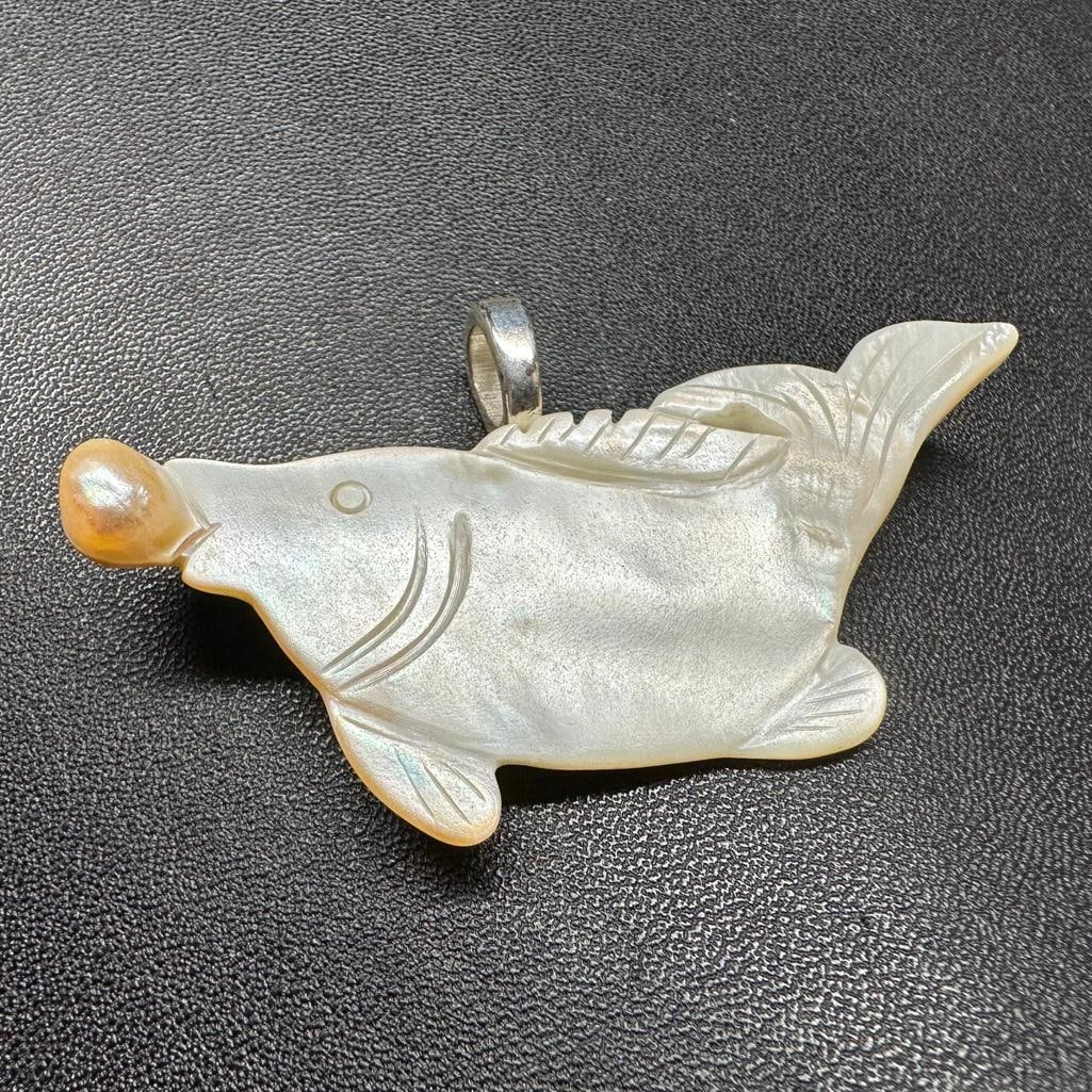 Hand-Carved Blister Pearl Pendant - Fish Eating: This piece of jewelry has been tested and researched prior to listing. Please view all our pictures they are part of our description. DETAILS: Metal - Base Metal Color - Silver Stones - Blister