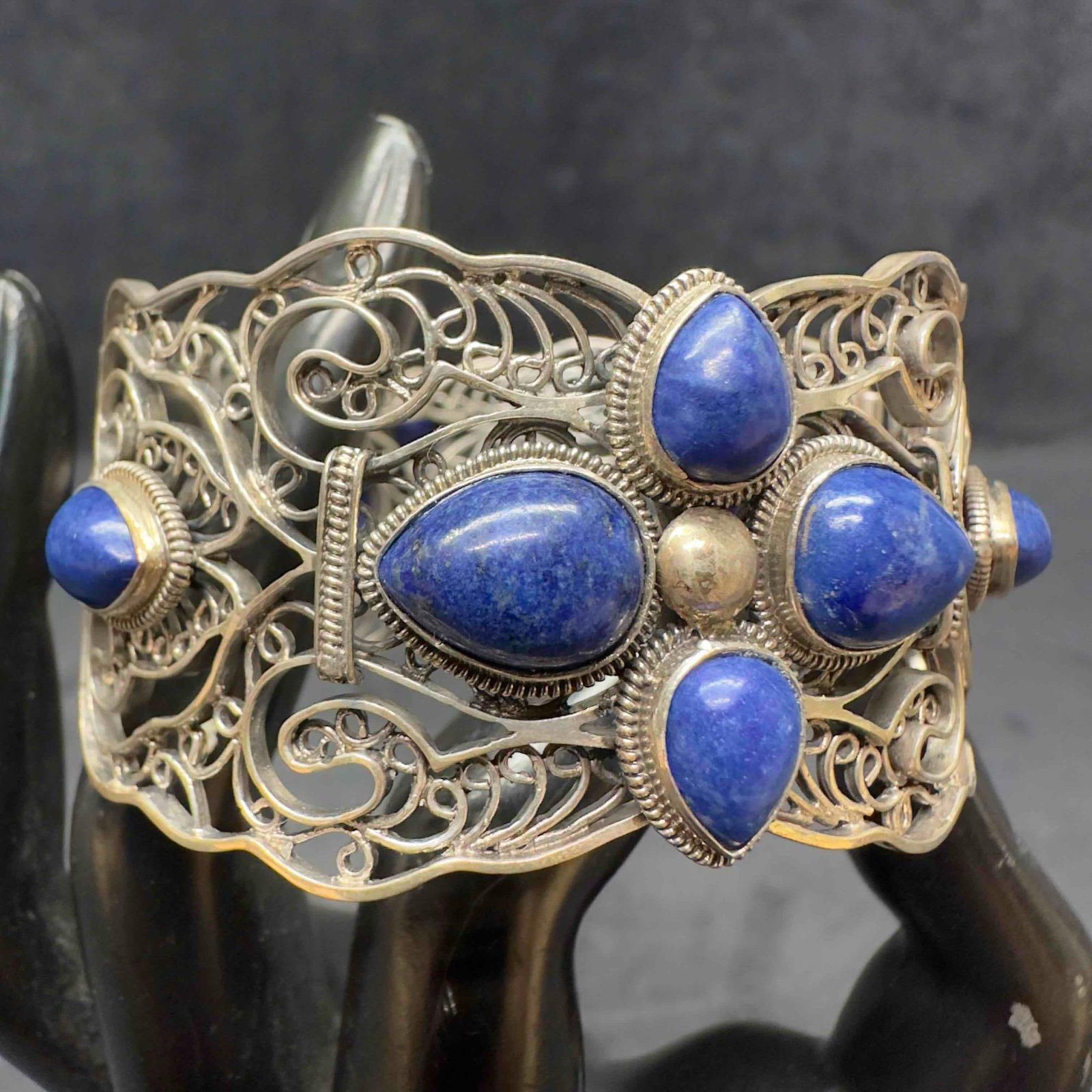 BJ 925 Sterling Silver Filigree Lapis Blue Gemstone Bangle Hinged Bracelet: This item is in good pre-owned, previously used/displayed condition with noticeable light wear, and surface scratches. Please reference all photos for full details. This piece of jewelry has been test