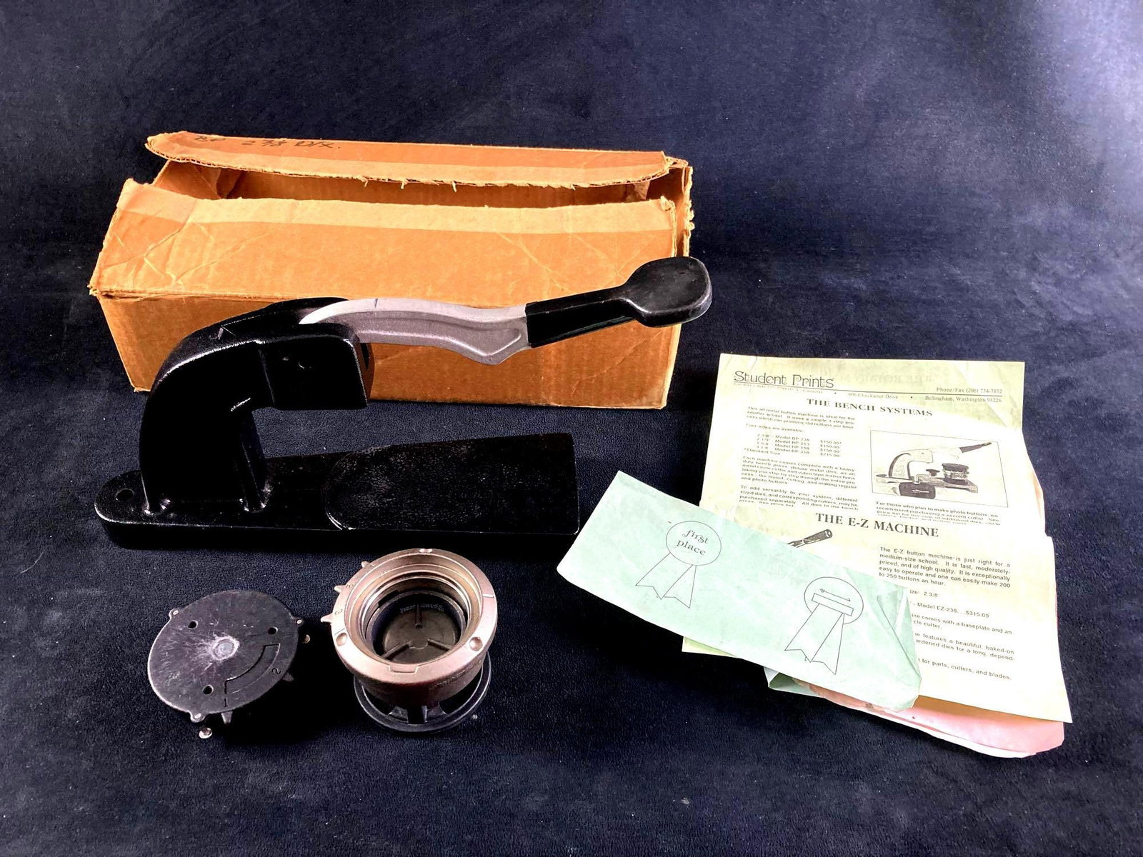 Student Prints The Bench System Button Machine: This lot includes: (1) Student Prints The Bench System Button Machine Condition is used and refer to photographs for additional details. The button maker is 2 3/8" and was purc
