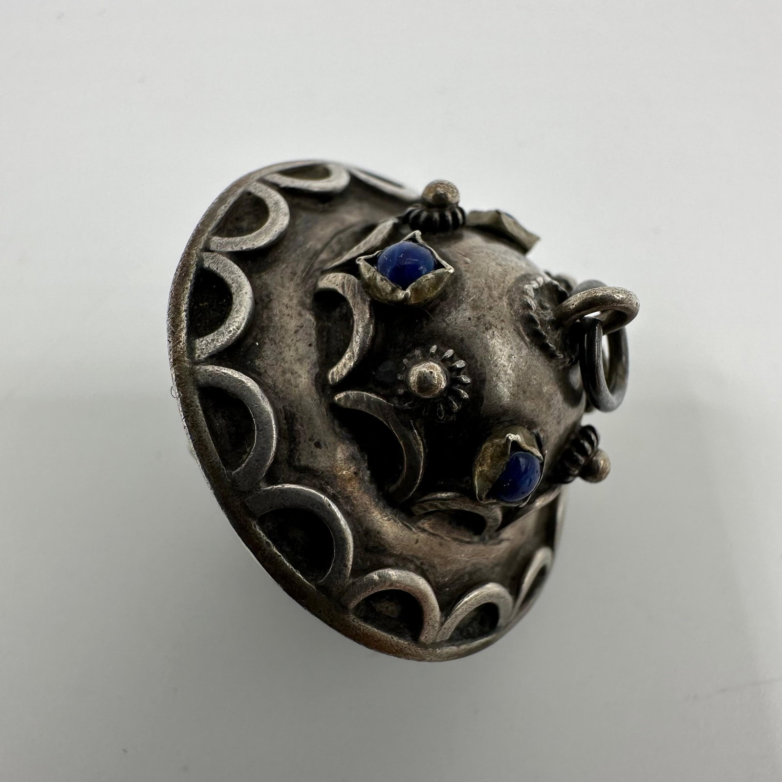 Lapis Lazuli Accent Disk Etruscan Revival Style Silver Charm: This item is in good pre-owned, previously used/displayed condition with noticeable light wear and surface scratches. Please reference all photos for full details. This piece of jewelry has been teste
