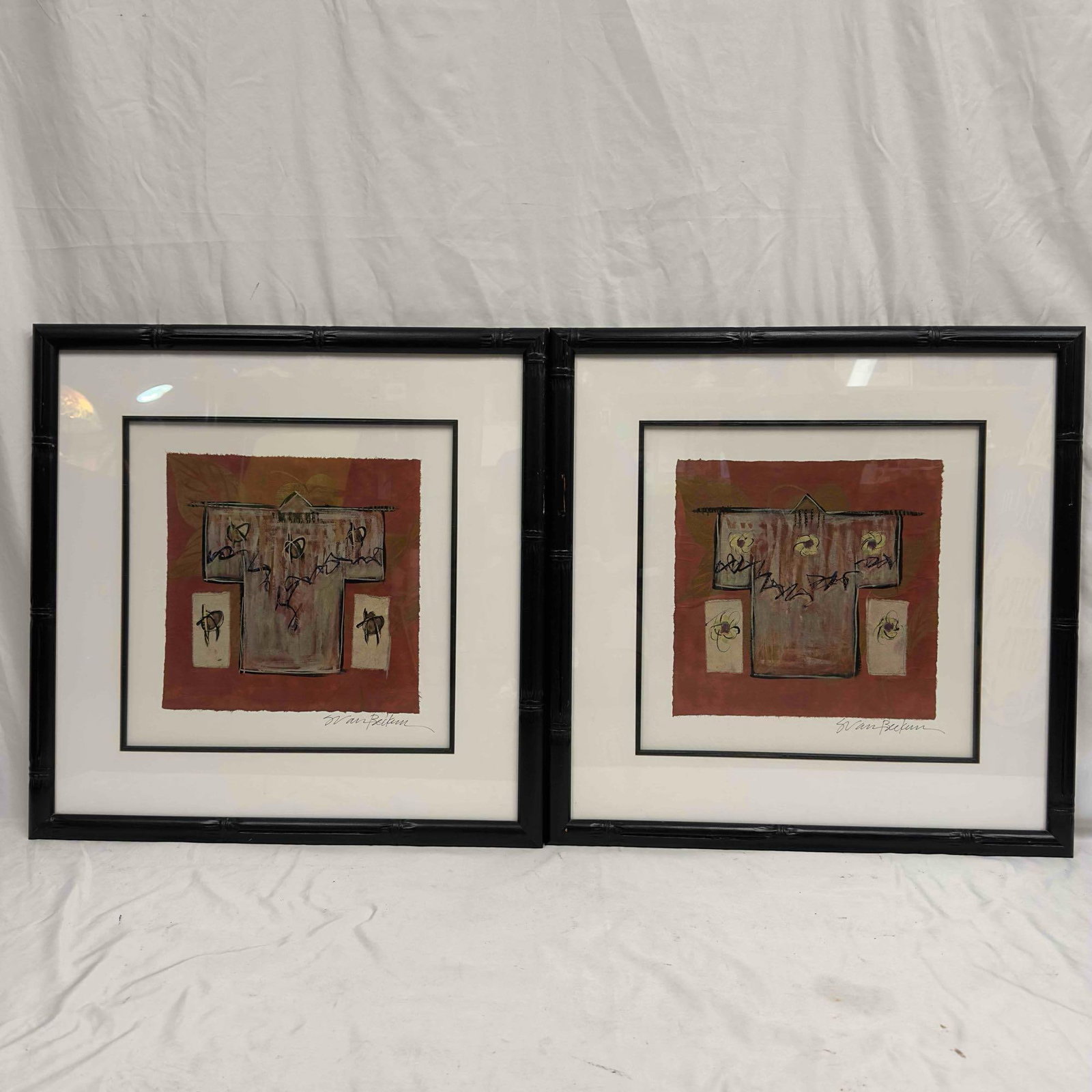 Sarah Van Beckum Mixed Media Artwork Matted Framed Set: Sarah Van Beckum Mixed Media Artwork Matted Framed Set. This set includes two art prints by Sarah Van Beckem matted and framed. The frame is a black colored bamboo style border, frame shows light