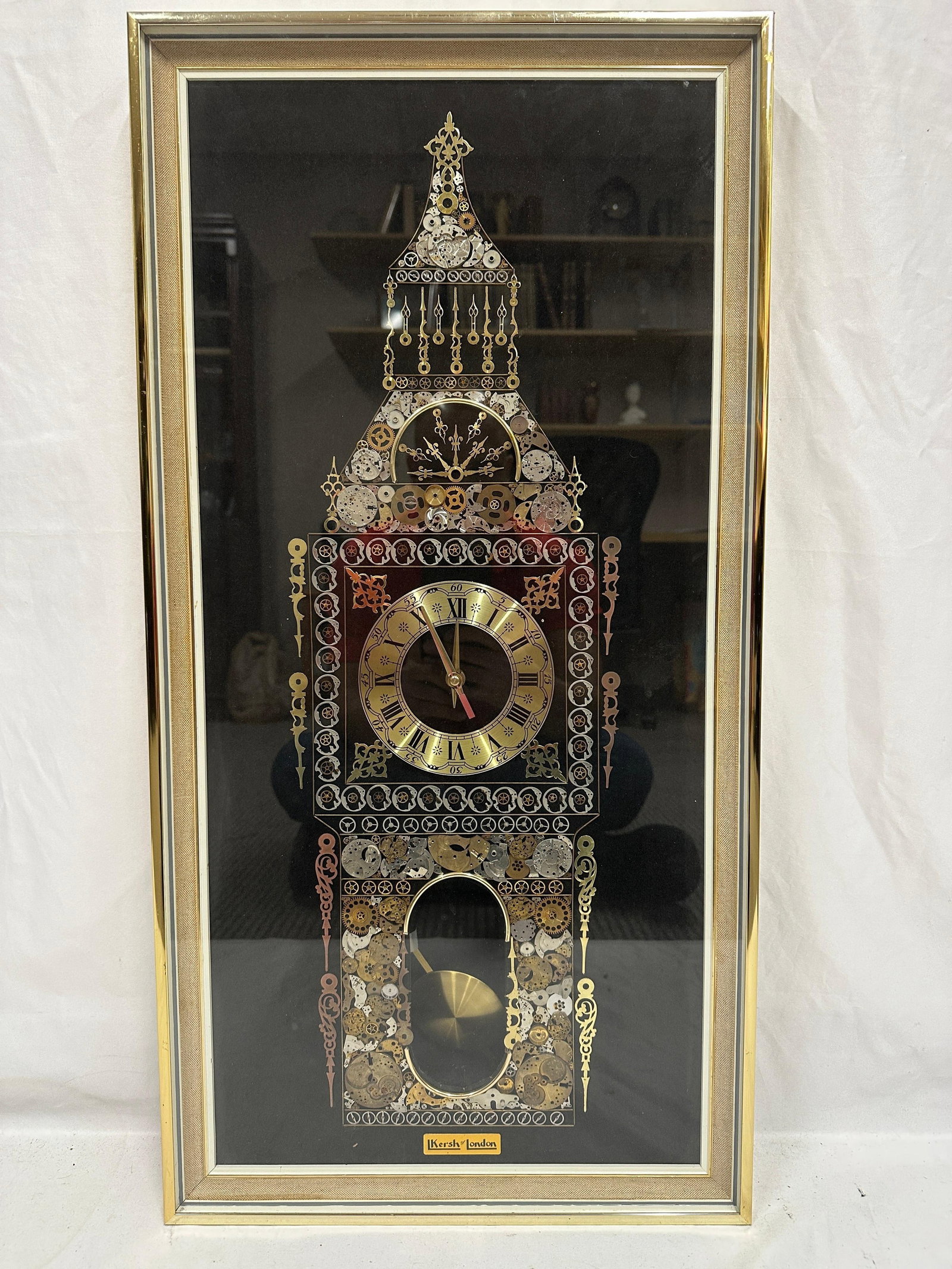 L. Kersh of London Original Horological Collage Wall Clock England: Decorative framed horological collage wall clock by L. Kersh of London. This intricate mixed-media composition is constructed from vintage watch and clock components arranged in the form of a traditio