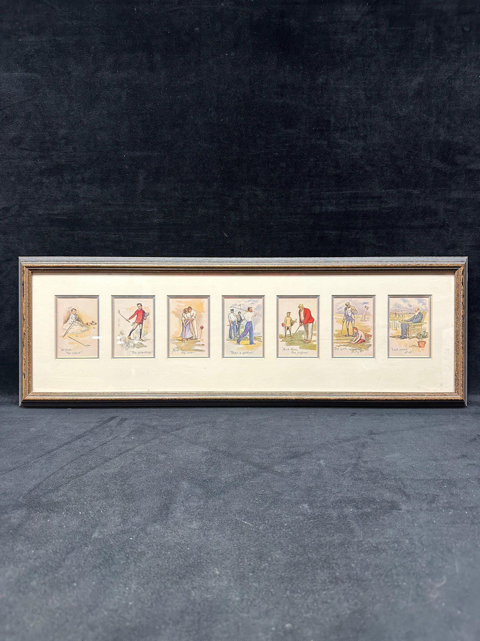 Framed Golf-Themed Seven Ages of Man Golf Art Print Series: Decorative framed print set depicting the "Seven Ages of Man" interpreted through the game of golf. Professionally matted and presented in a long rectangular wood-tone frame under glass. A cha