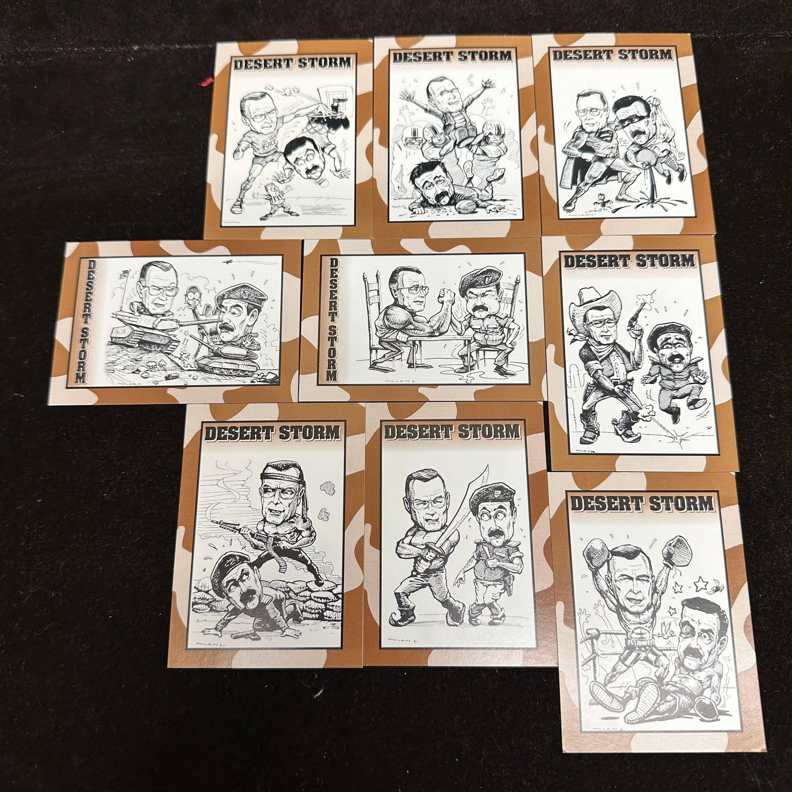 1991 Desert Storm Card Collection Crown Sports Cards Complete Nine Card Set: Complete 9-card Desert Storm trading card set produced by Crown Sports Cards in 1991. Includes all numbered cards #1 through #9 titled. Features black and white caricature artwork with camouflage