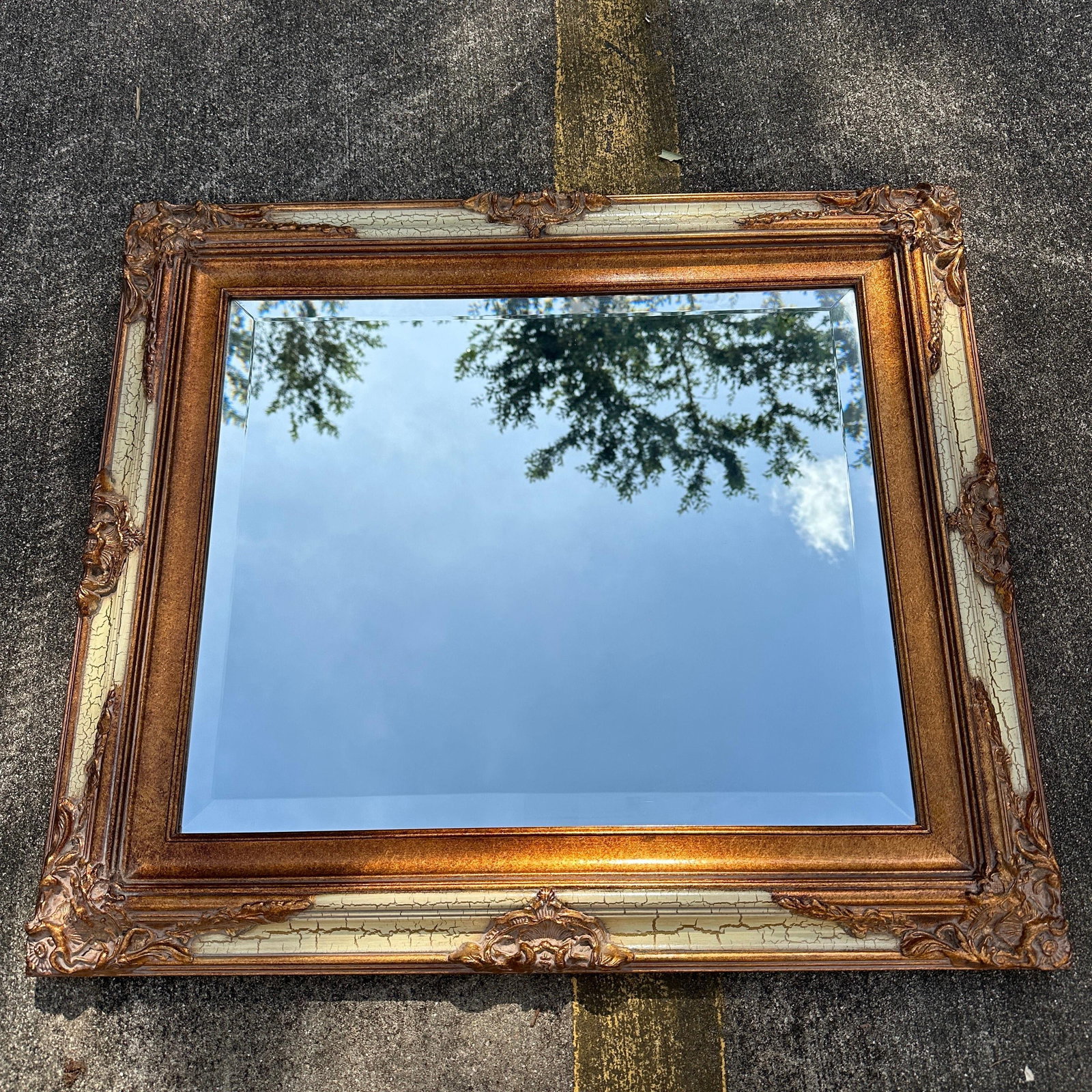 Rectangular Ornate Beveled Wall Mirror Crackle Finish Style Frame: Decorative wall mirror featuring a substantial molded frame with raised Rococo-style scrollwork, antiqued bronze-tone finish, and cream crackle accents. The mirror retains its beveled glass and presen