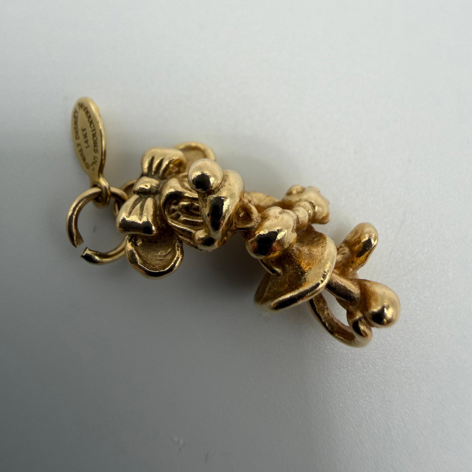 14K Walt Disney Productions Minnie Mouse Yellow Gold Charm: This item is in good pre-owned, previously used/displayed condition with noticeable light wear and surface scratches. Please reference all photos for full details. This piece of jewelry has been caref