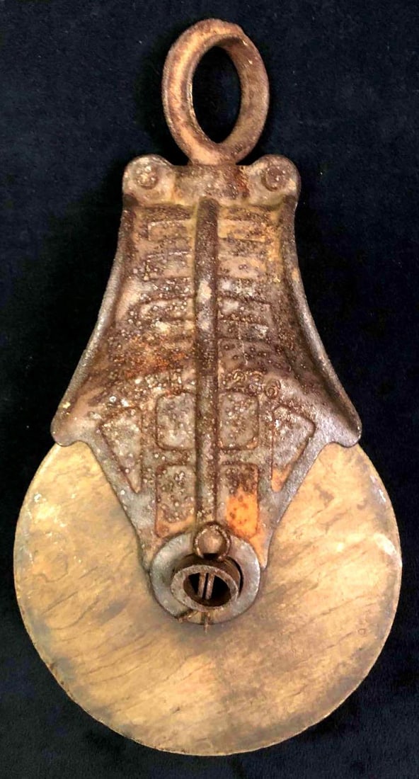 Large Antique Cast Iron and Wood Barn Pulley: This lot contains a large antique cast iron & wood barn pulley. This item was originally used to move hay from horse-drawn carts to lofts but now works as the perfect rustic home decor. It is app