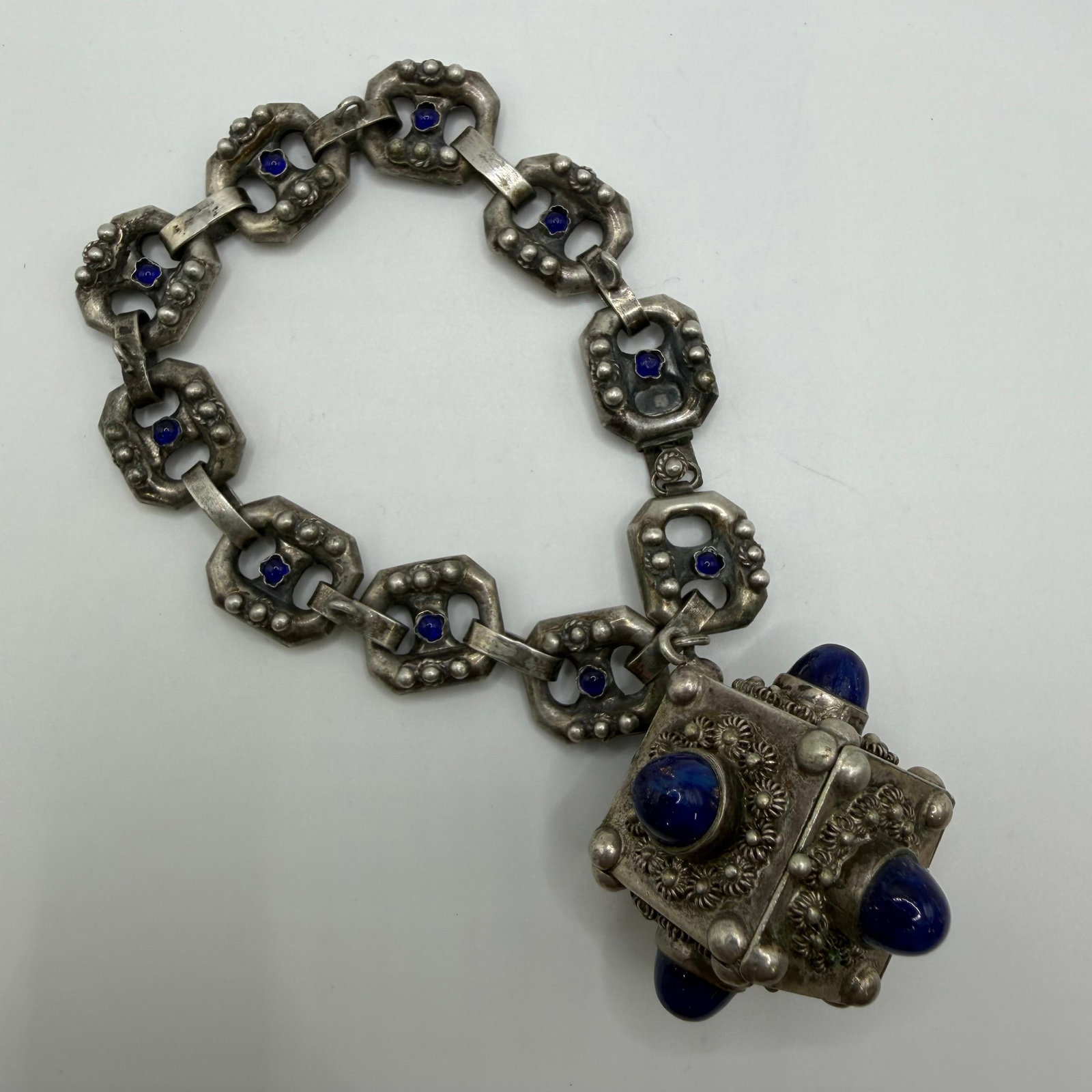 Locket Box Lapis and Blue Glass Accent 800 Silver Floral Motif Bracelet ER30: This item is in pre-owned, previously used/displayed condition with noticeable light wear and surface scratches. Please reference all photos for full details. This piece of jewelry has been carefully 
