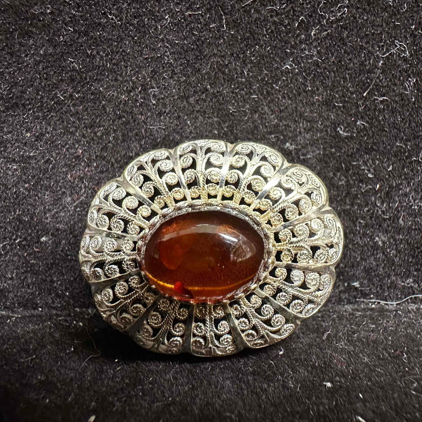 Ornate Filigree Metalwork Amber Cabochon Sterling Silver 935 Brooch: This item is in good pre-owned, previously used/displayed condition with noticeable light wear, and surface scratches. Please reference all photos for full details. This piece of jewelry has been test