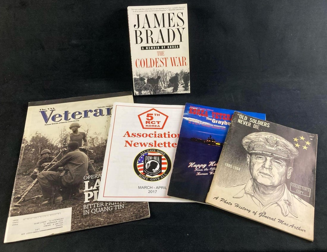 Korea and Vietnam Combat Veteran Magazine and Book Lot: This lot includes: (1) The Coldest Winter by James Brady (1) 5th Regimental Combat Team Newsletter (1) Korea Veterans Happy Holidays Magazine (1) A Pictorial History of General MacArth