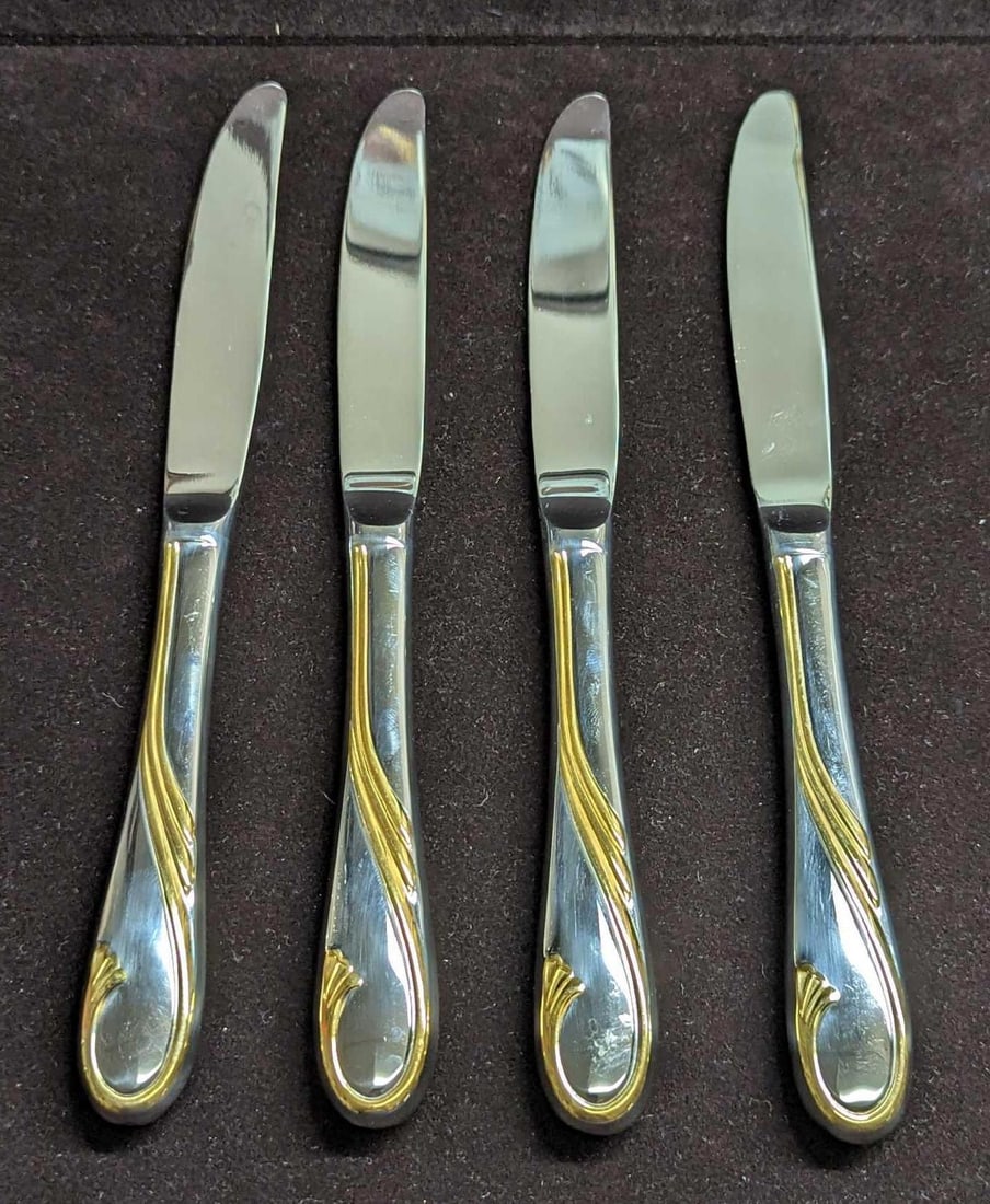 4 Retired Gorham Golden Swirl Dinner Knives B: 4 Retired Gorham Golden Swirl Dinner Knives B. This series was released by Gorham Silver from the year 1982 to the year 2001. These stainless steel knives have signs of light wear with markings and sm