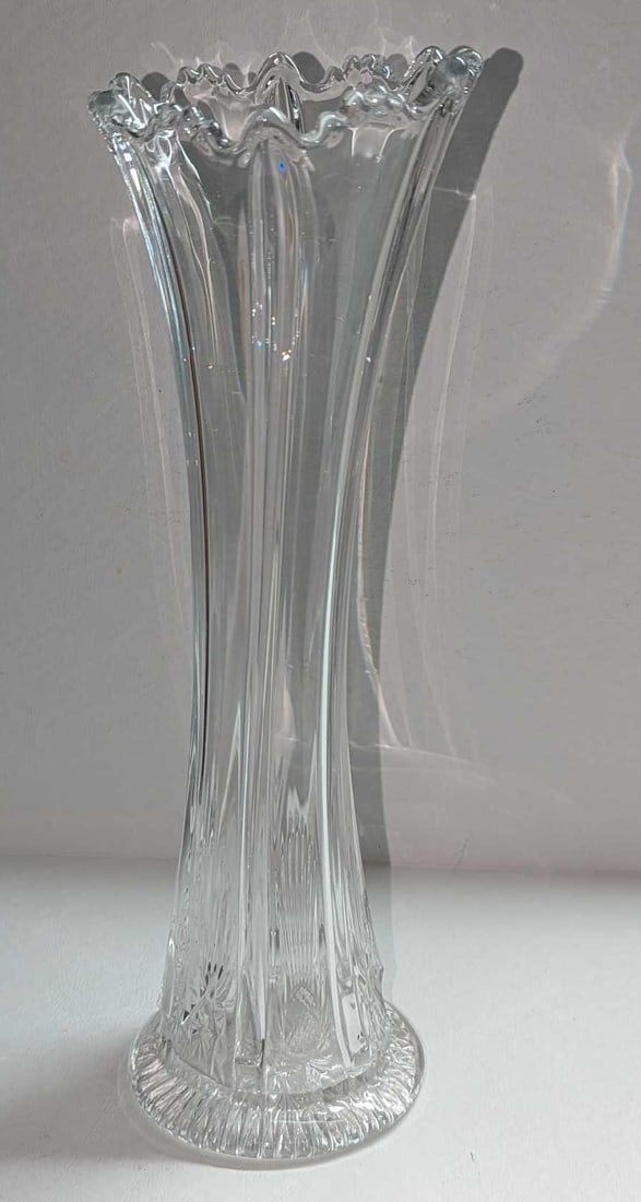 Vintage 12" Clear Glass Vase: Vintage 12" Clear Glass Vase. This is approx 4" x 4" x 12 1/2" and it weighs 1.49lb. The vase has some light markings and scratches.