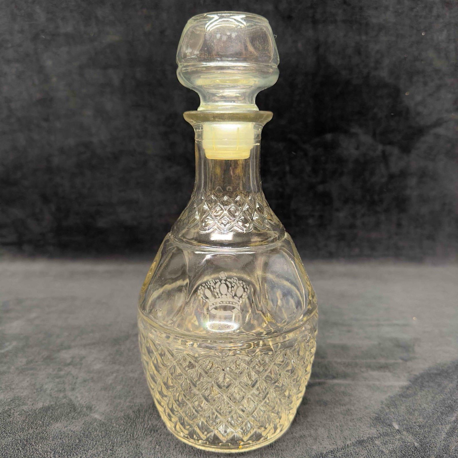 Vintage Crown Royal Liquor Decanter with Bottle Stopper: Vintage Crown Royal Liquor Whiskey/Wine Decanter with Glass Bottle Stopper. Featuring some beautiful raised glass designs like diamond and egg glass patterns with frosted glass "crown" on